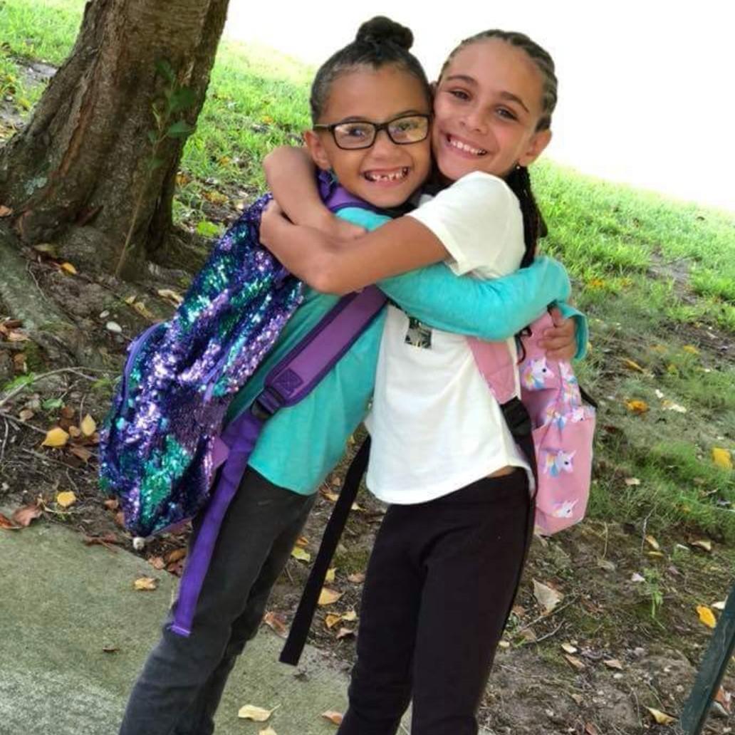 Flower girls. Sisterly love!