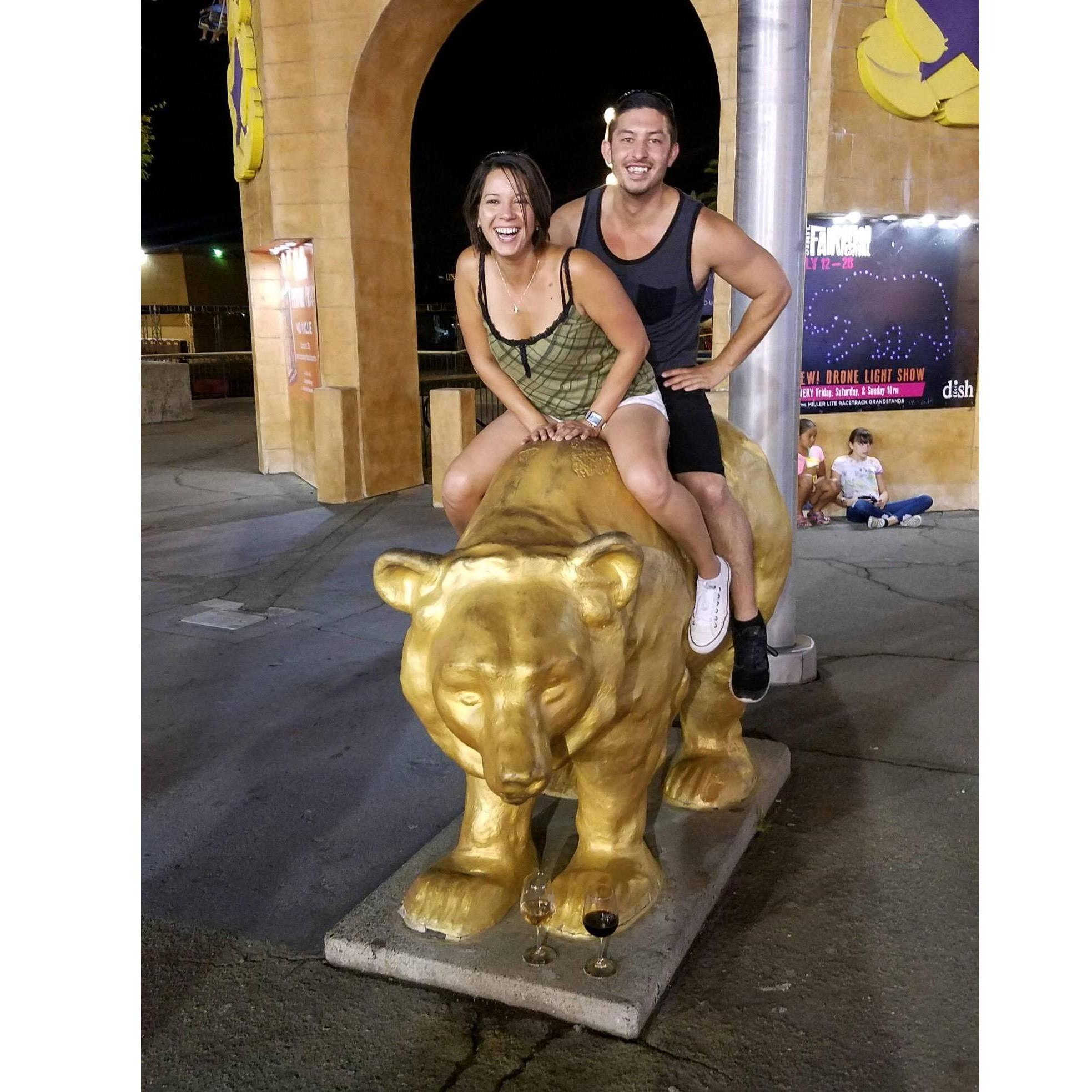 Esther teaching Dom about her love of climbing statues