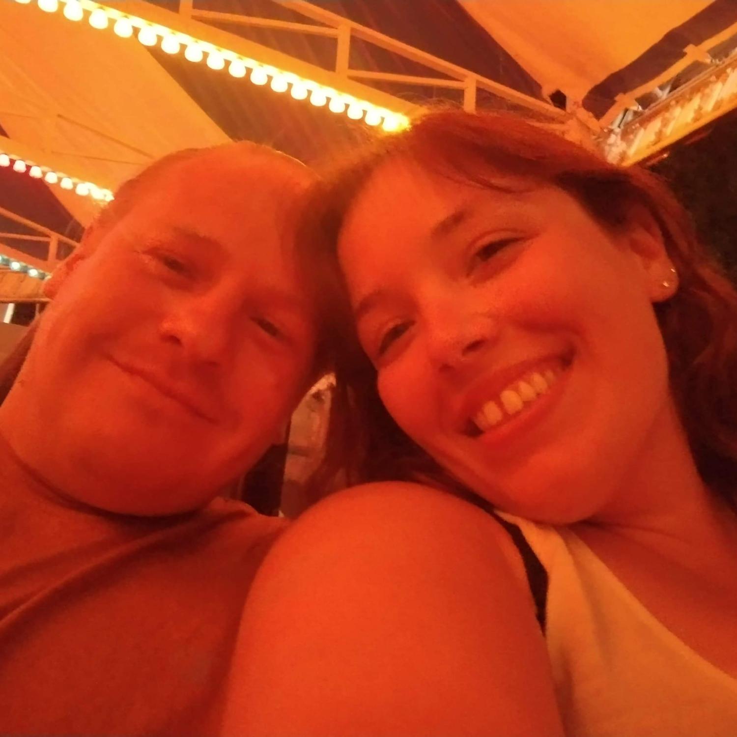 James always takes pictures of Danielle on amusement park rides.