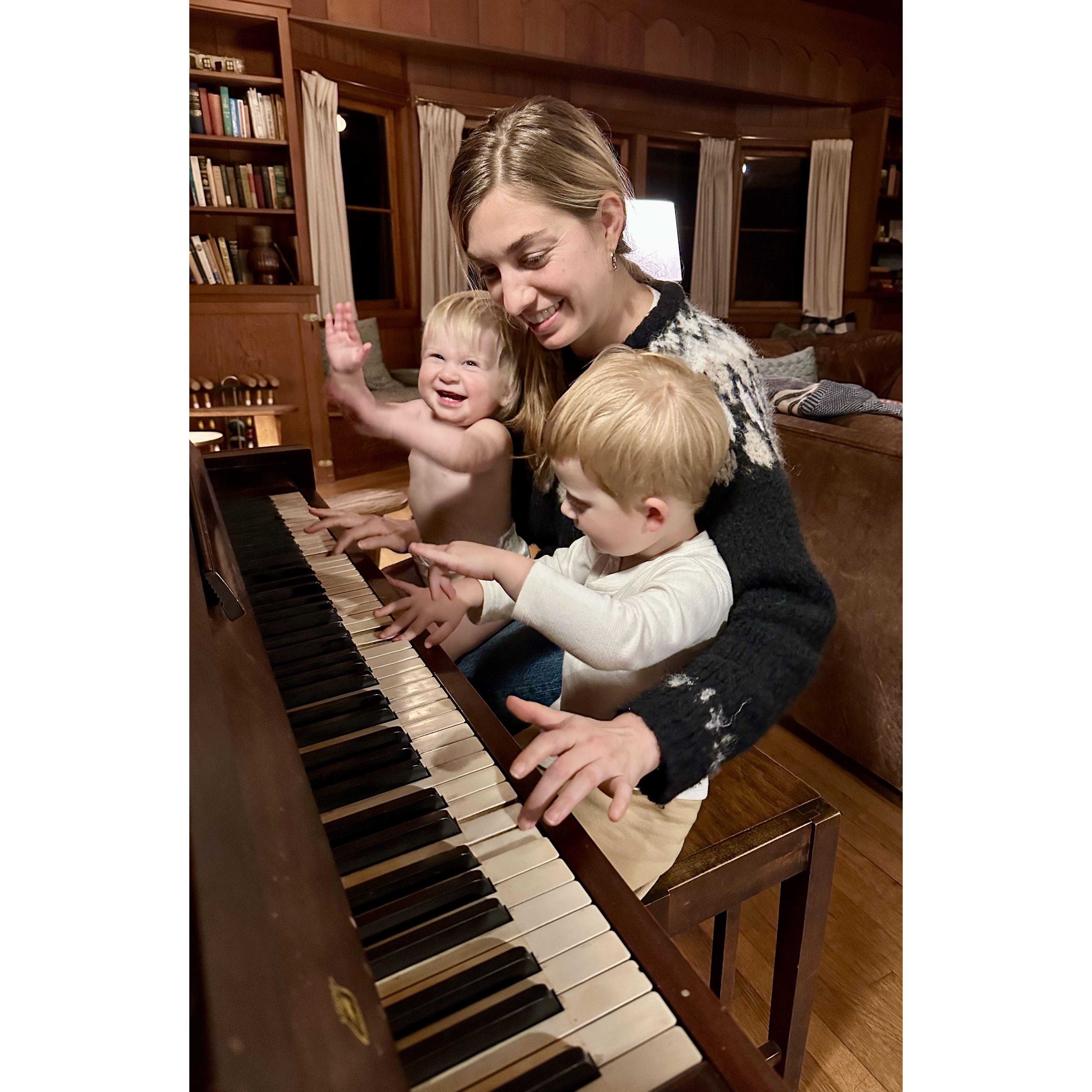 Playing the piano with niece Clara and nephew Henry