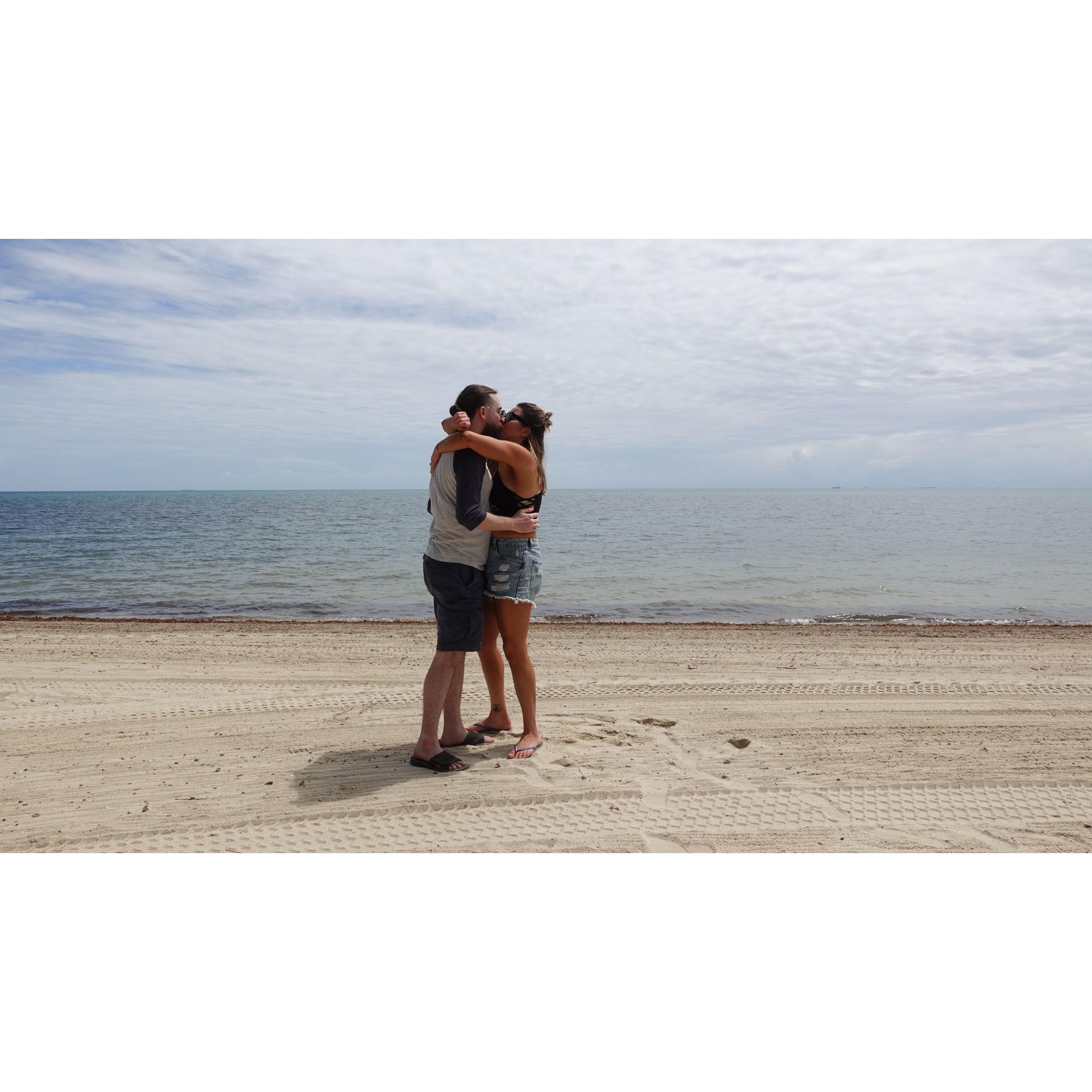 The moments after I said yes, on a beach in Placencia, Belize