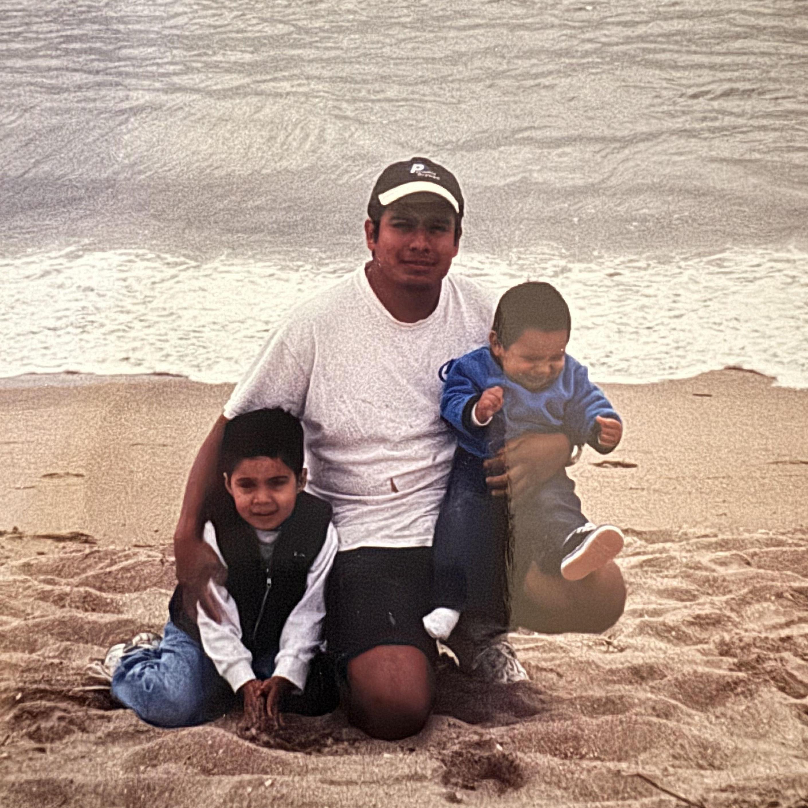 Older brother Jacob, father Samuel, and baby Joel
