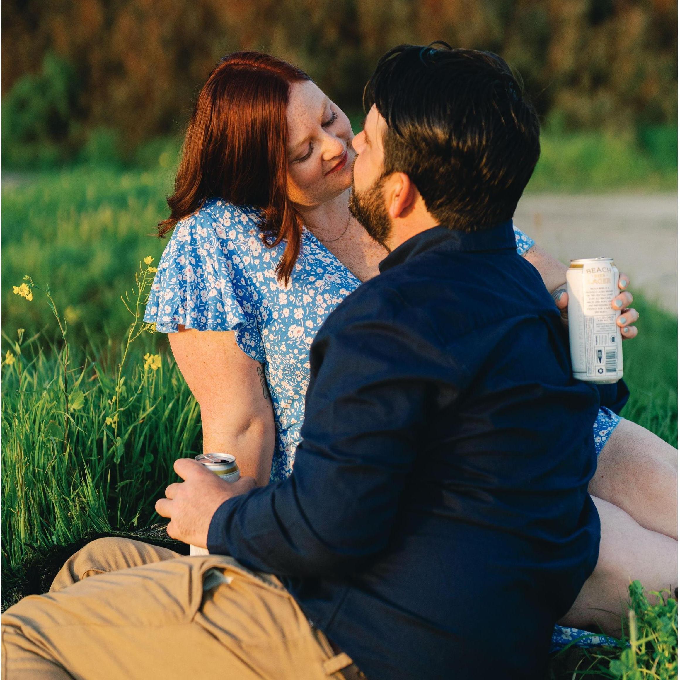 One of our favorite photos from our engagement shoot; we brought along some Beach Beer from Captain Fatty's!