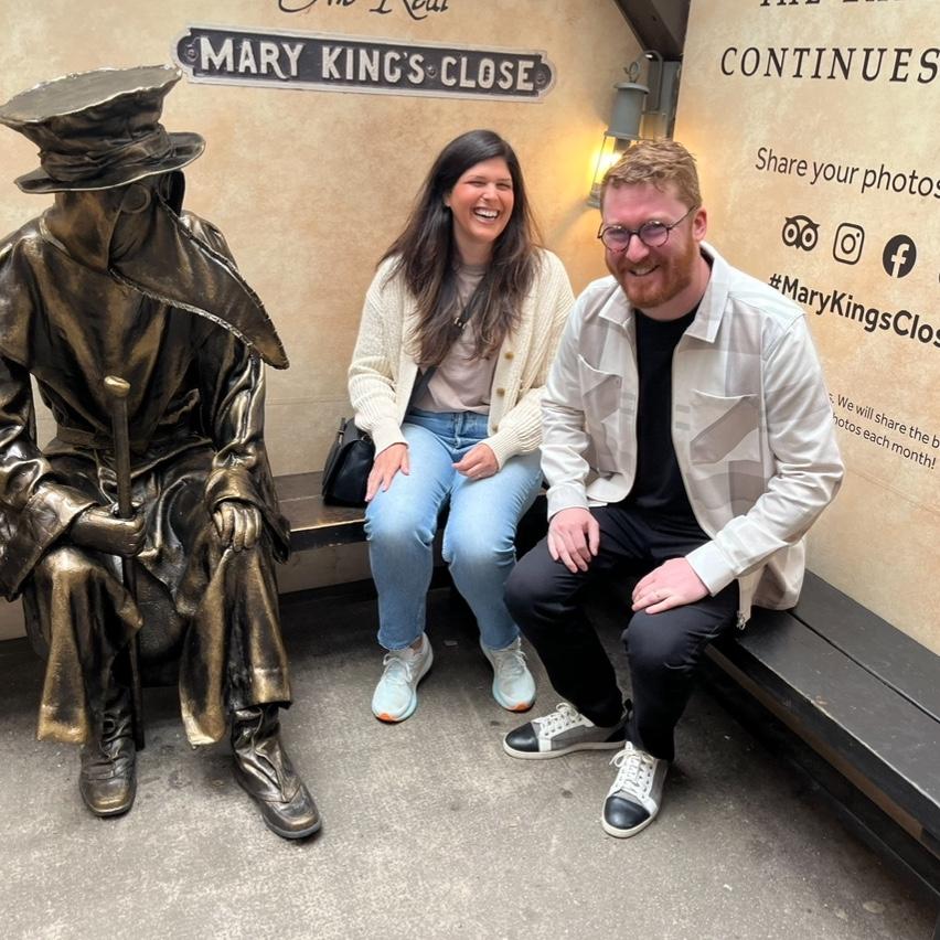 Cracking jokes next to the plague doctor. 
We are very serious people!