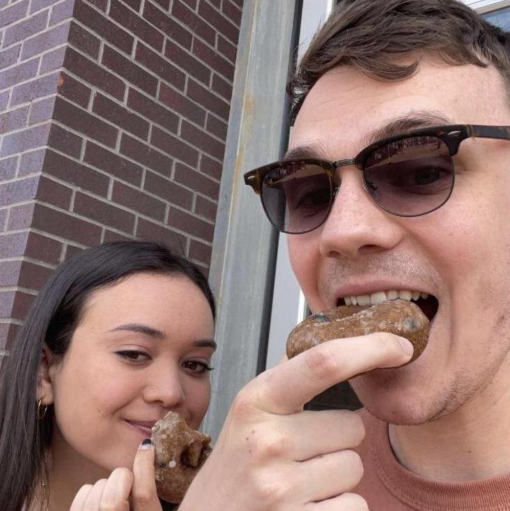 Eating blueberry donuts at a farmers market in Michigan.