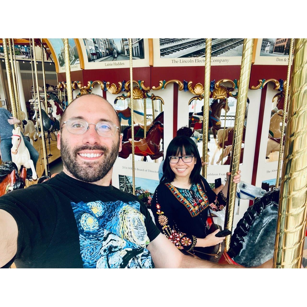 Our new tradition: ride on every carousel we can find.
