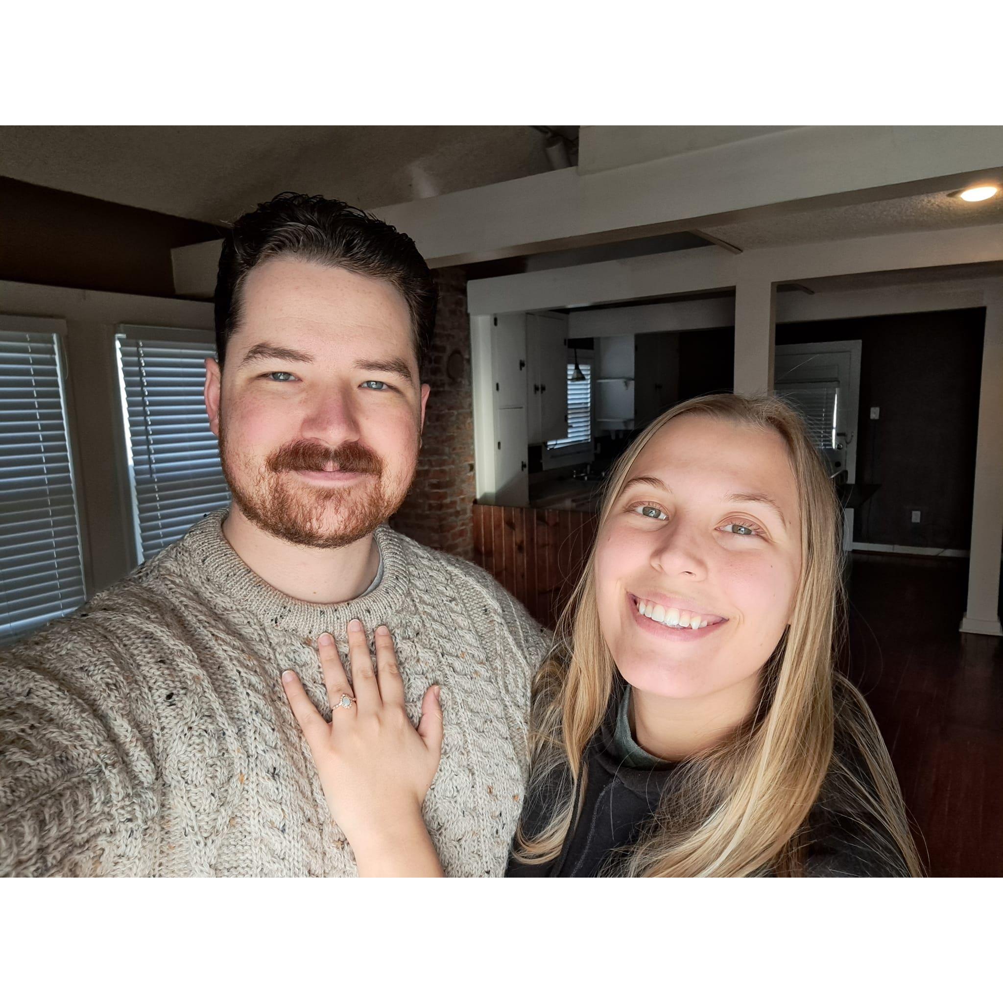 The day we got the house, we excitedly went by to see it. At the front door, Daniel picked me up and carried me inside! Upon sitting me down, he got down on one knee, pulled out a ring, and proposed!