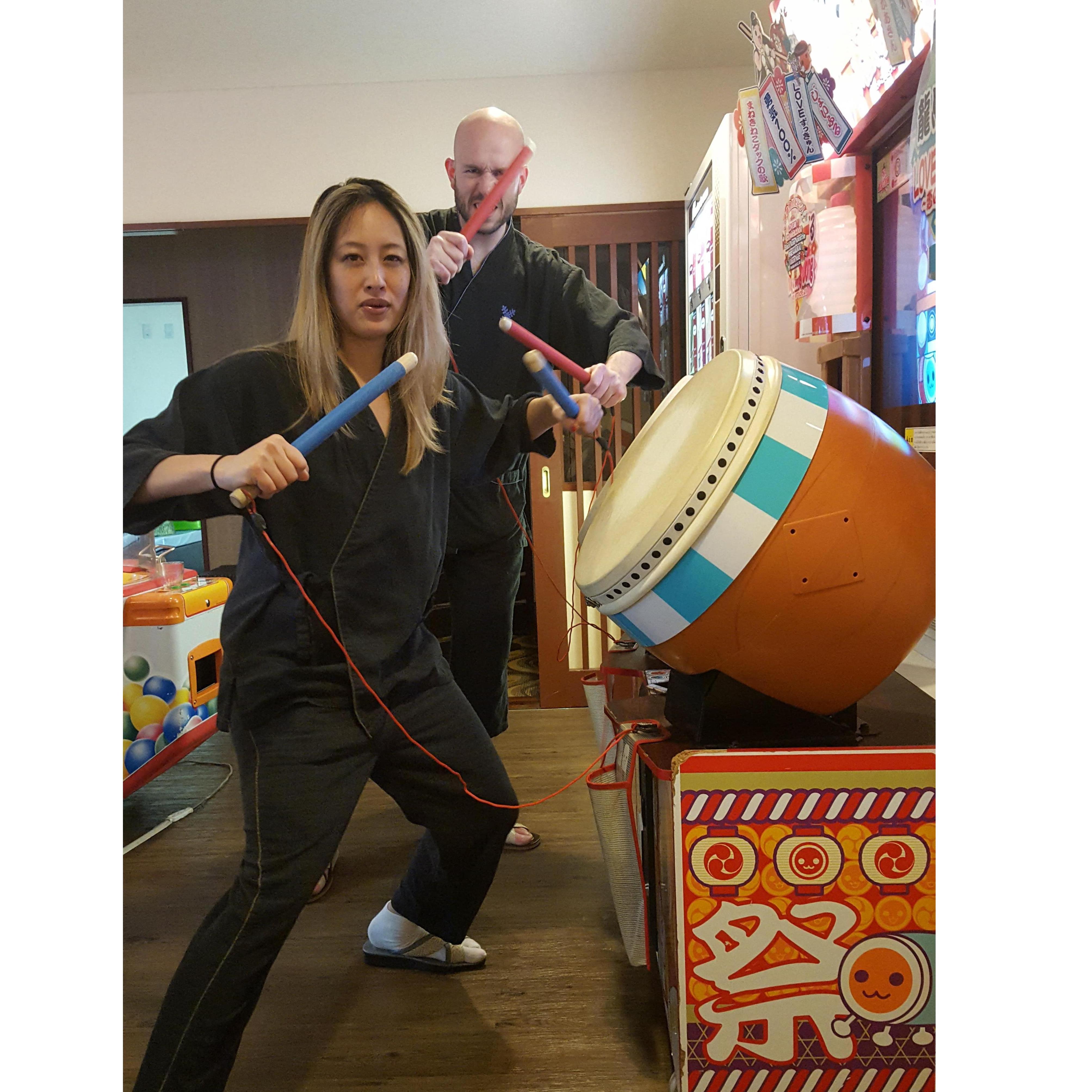 Drum battles in Japan! Caroline won (Dan disagrees). BTW if anyone gets this drum video game set for us as a wedding present, you're immediately promoted to Friend #1.