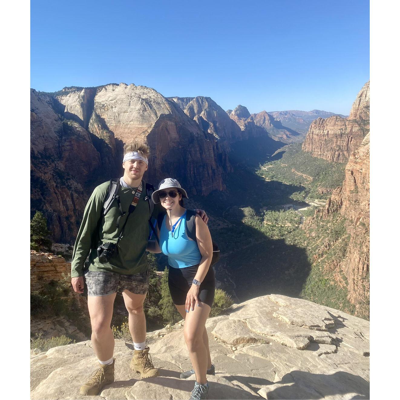 One of Halie and Michael's favorite trips was to Zion National Park in July 2022. This is them at the top of Angel's Landing - one of the most dangerous hikes in America!