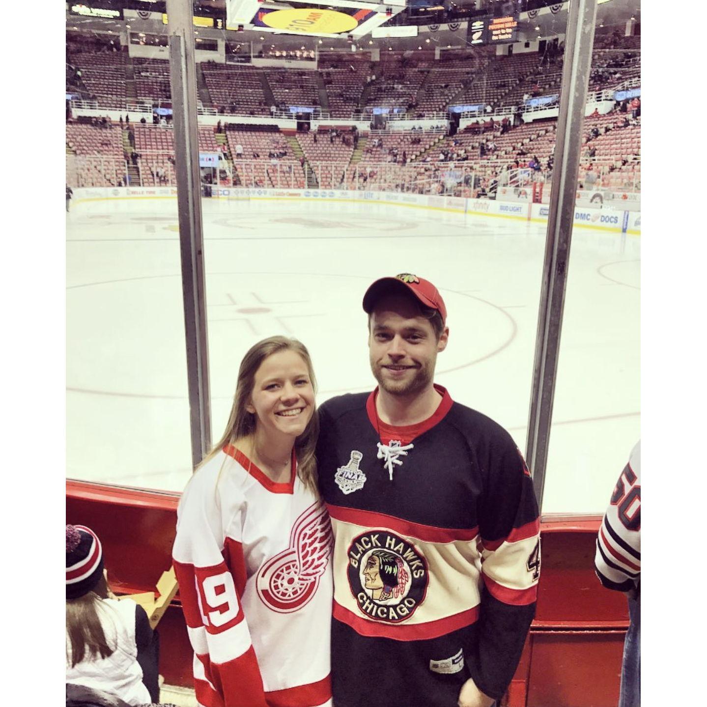 February 2017: A house divided! Hallie took Josh to the last Wings vs. Hawks game at the Joe Louis Arena