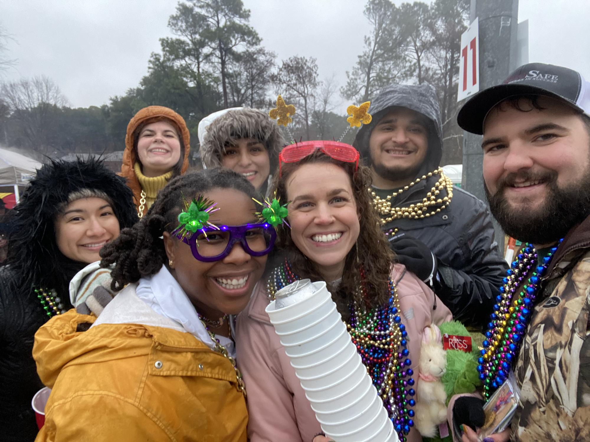 Lora, Tim, & friends at Shreveport Mardi Gras in 2022