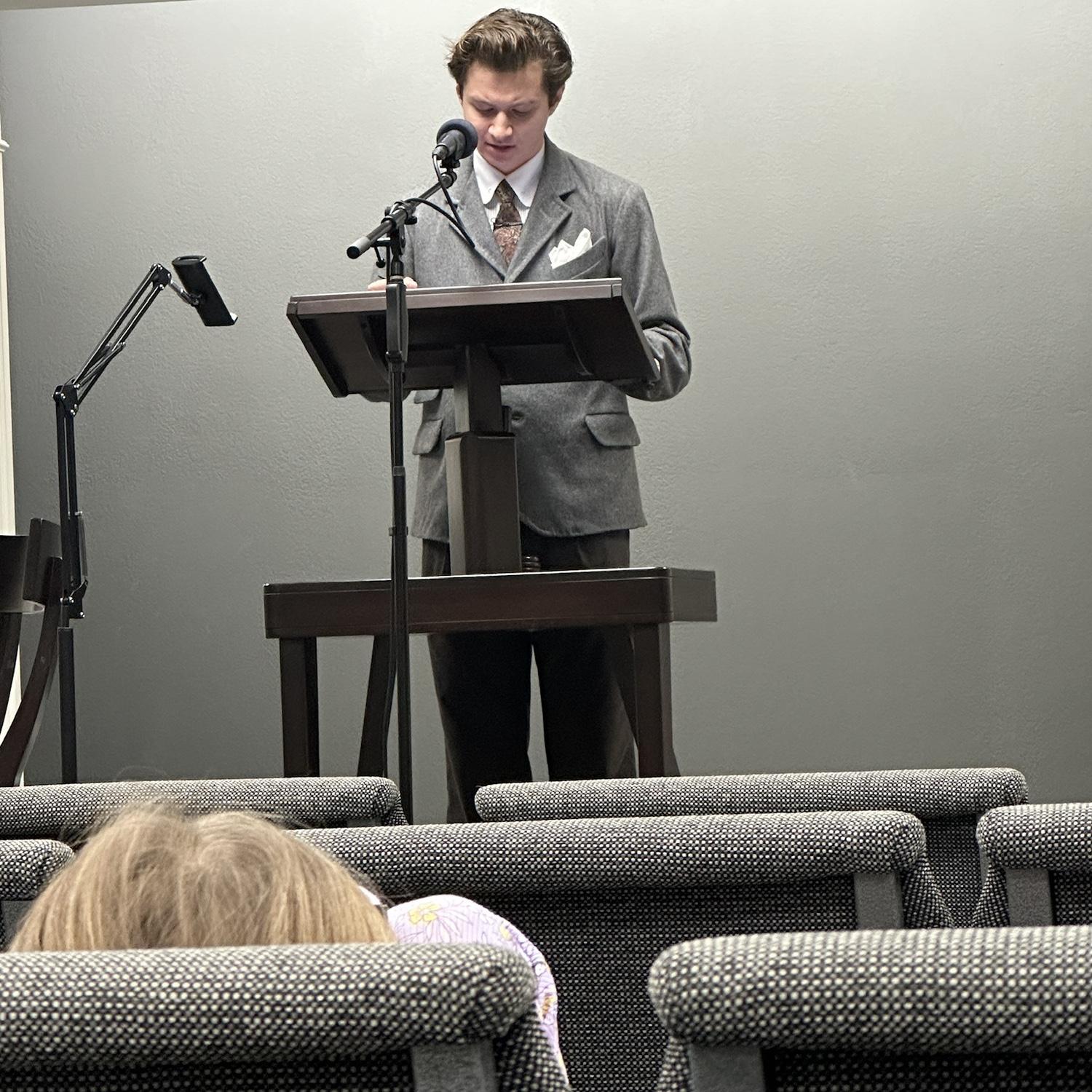 Isaac giving his second public talk
