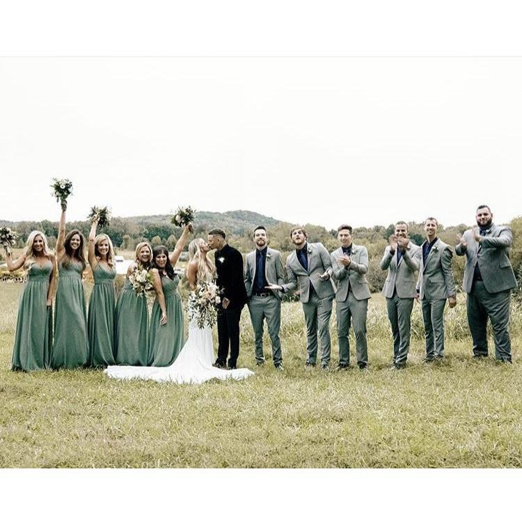 Bridesmaids and Groomsmen and us in the middle