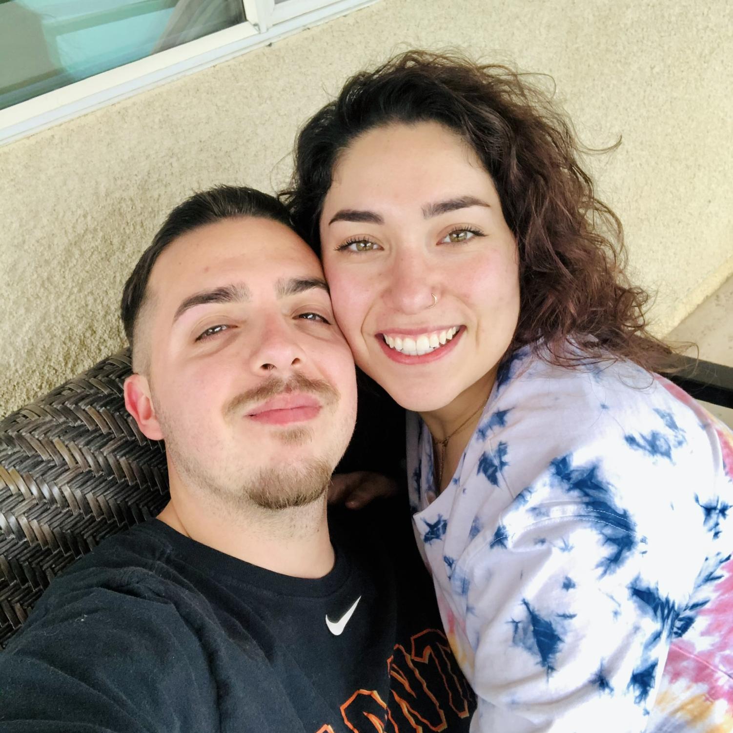 2020: One of our first photos together- during the COVID conception where we dated on the Elisha’s patio!!