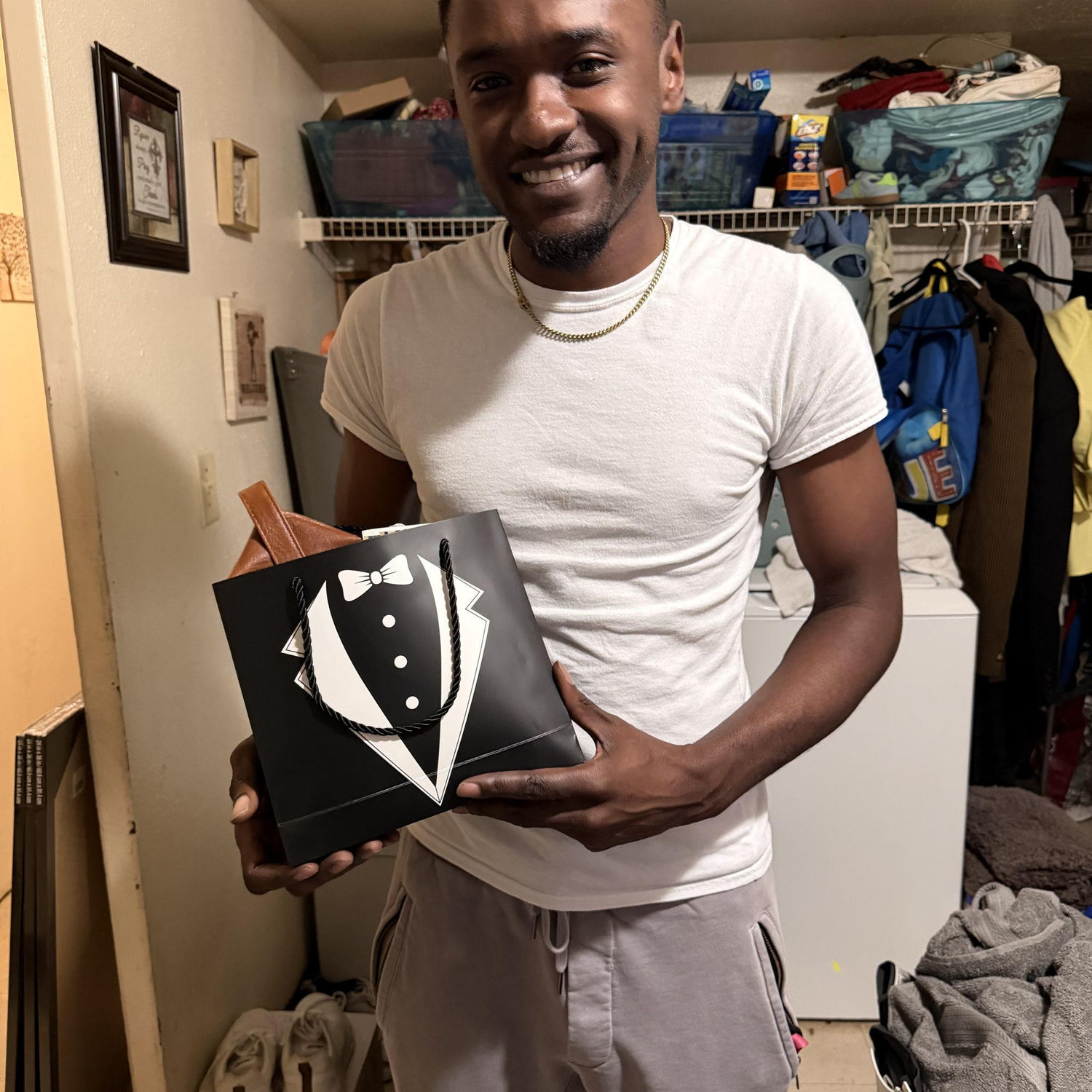 Booney accepting his groomsman box!