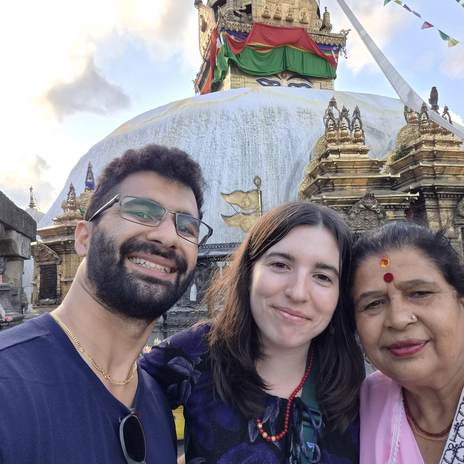 Dinesh, Erin, and Dinesh's biological mom Laxmi at Boudha Stupa, Kathmandu Nepal