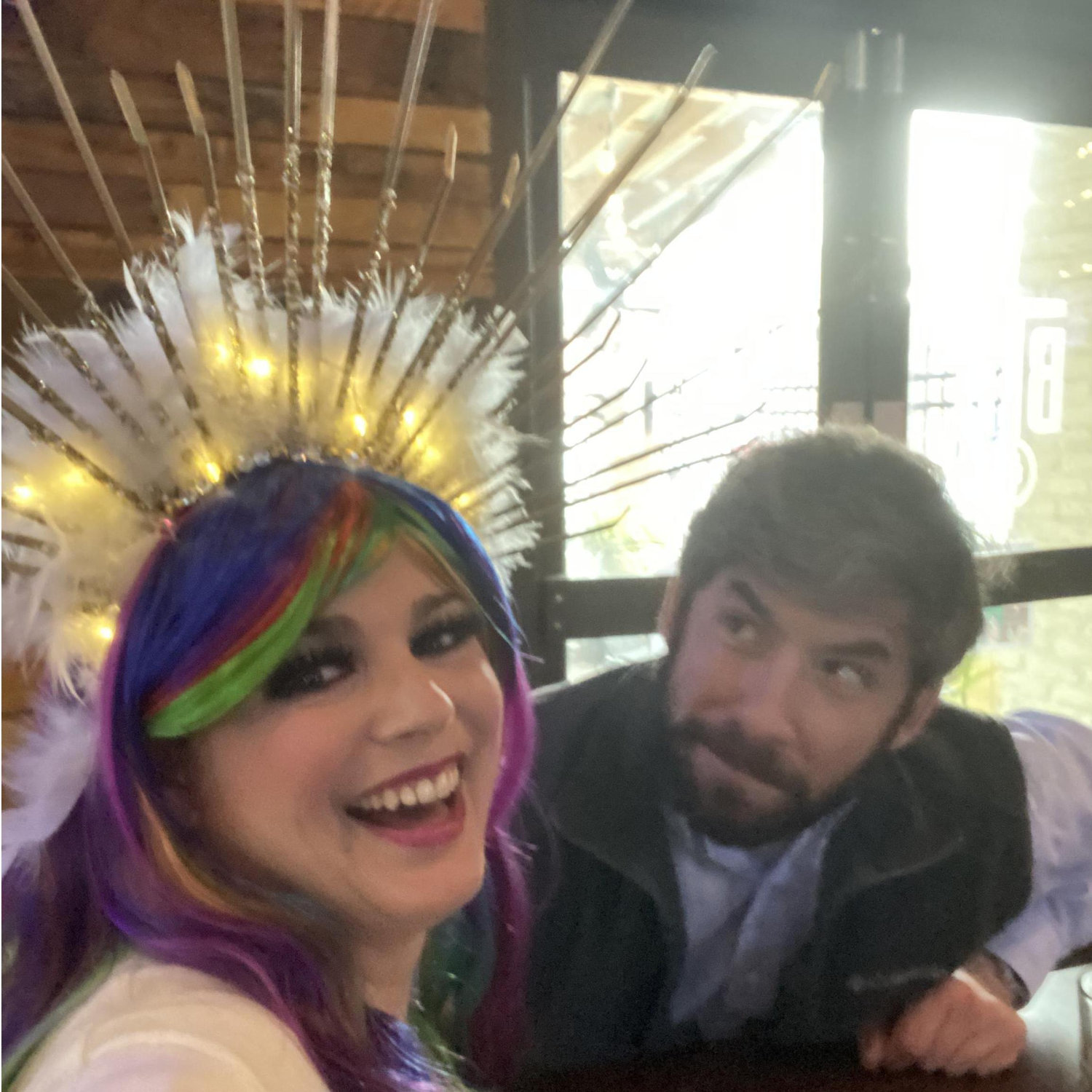 Emily loves sequins, rhinestones, glitter, wigs, and costumes in general. Anthony is not so sure.