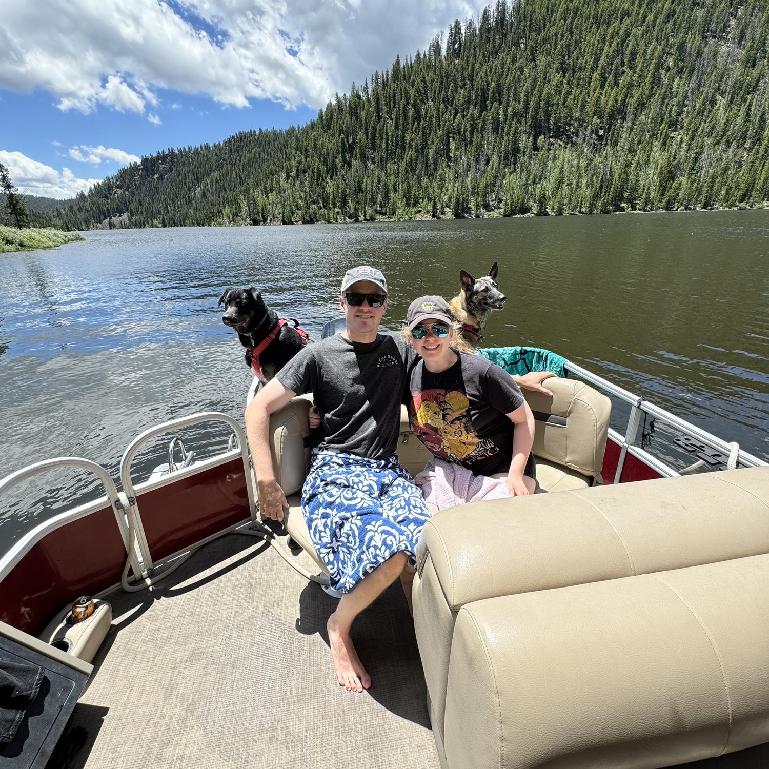 Spending time together on the water with the doggies