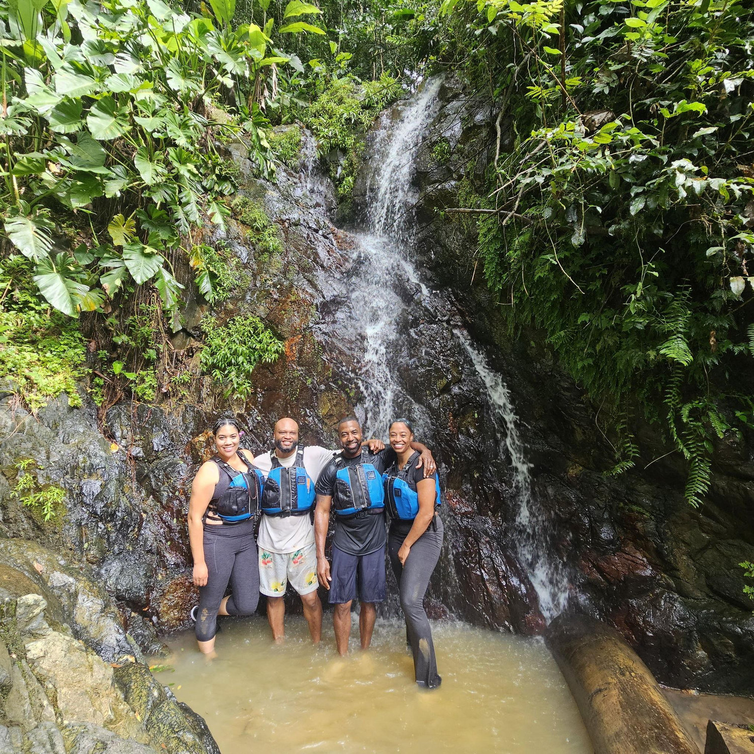 Enjoying the rain forest in Puerto Rico with our friends.