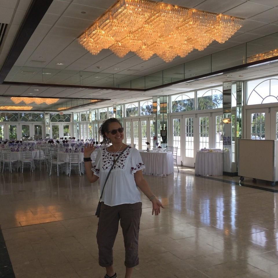 Checking out the reception hall and planning decorations. (I wear that top a lot)