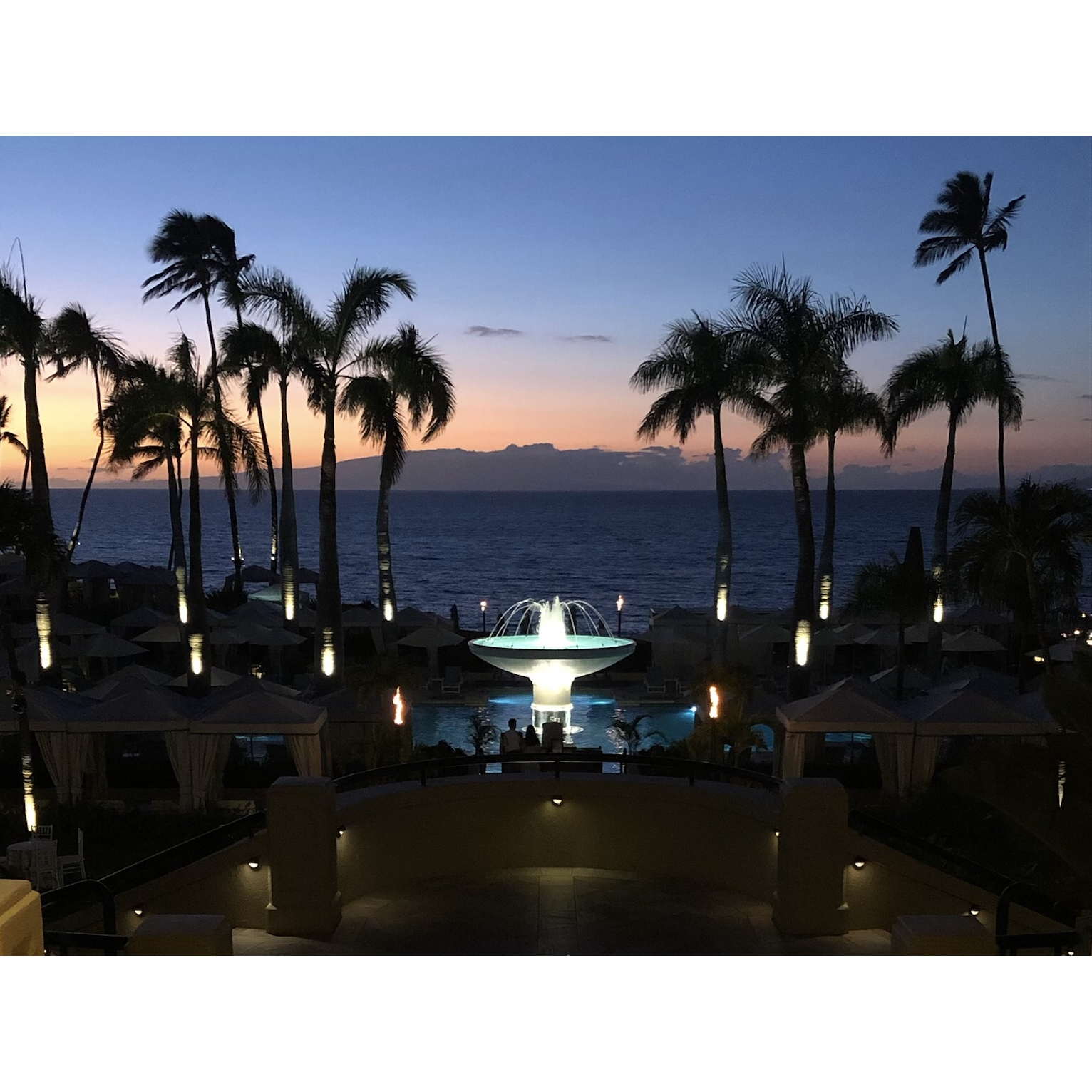 Our beautiful hotel in Maui at sunset (for any White Lotus fans out there).