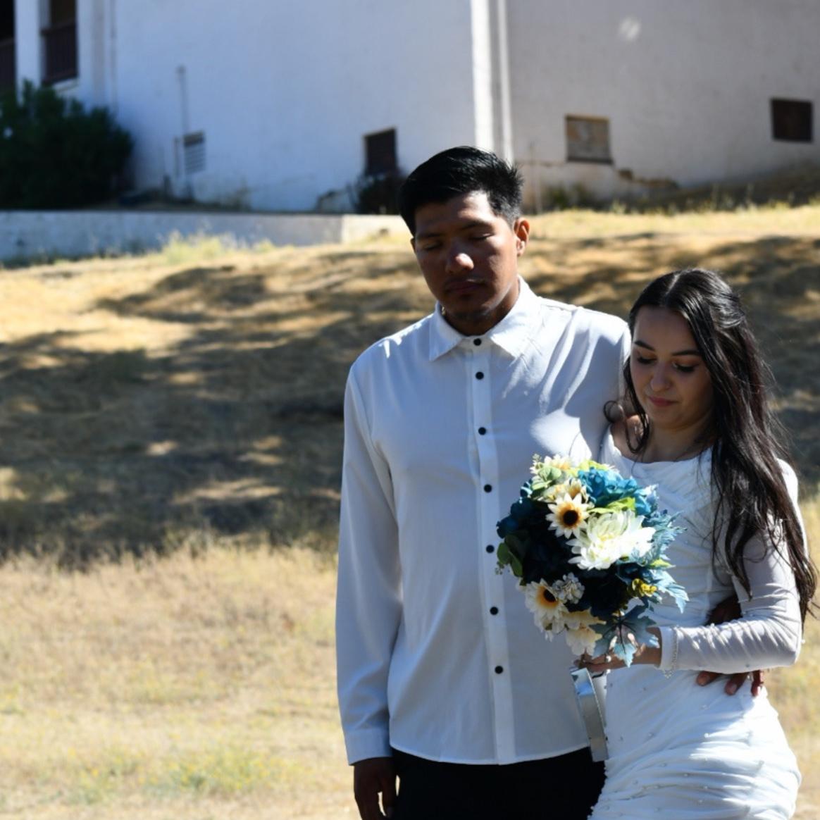 Us in 102 degree weather taking photos changing outfits :)