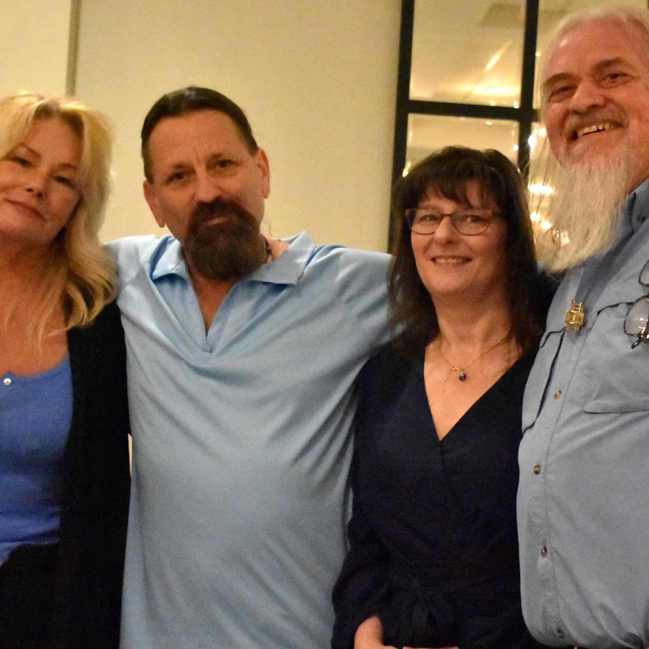 LEFT TO RIGHT: Lisa, Logan’s father Scott, Mabel’s mother Deb, & Mabel’s father Wayne