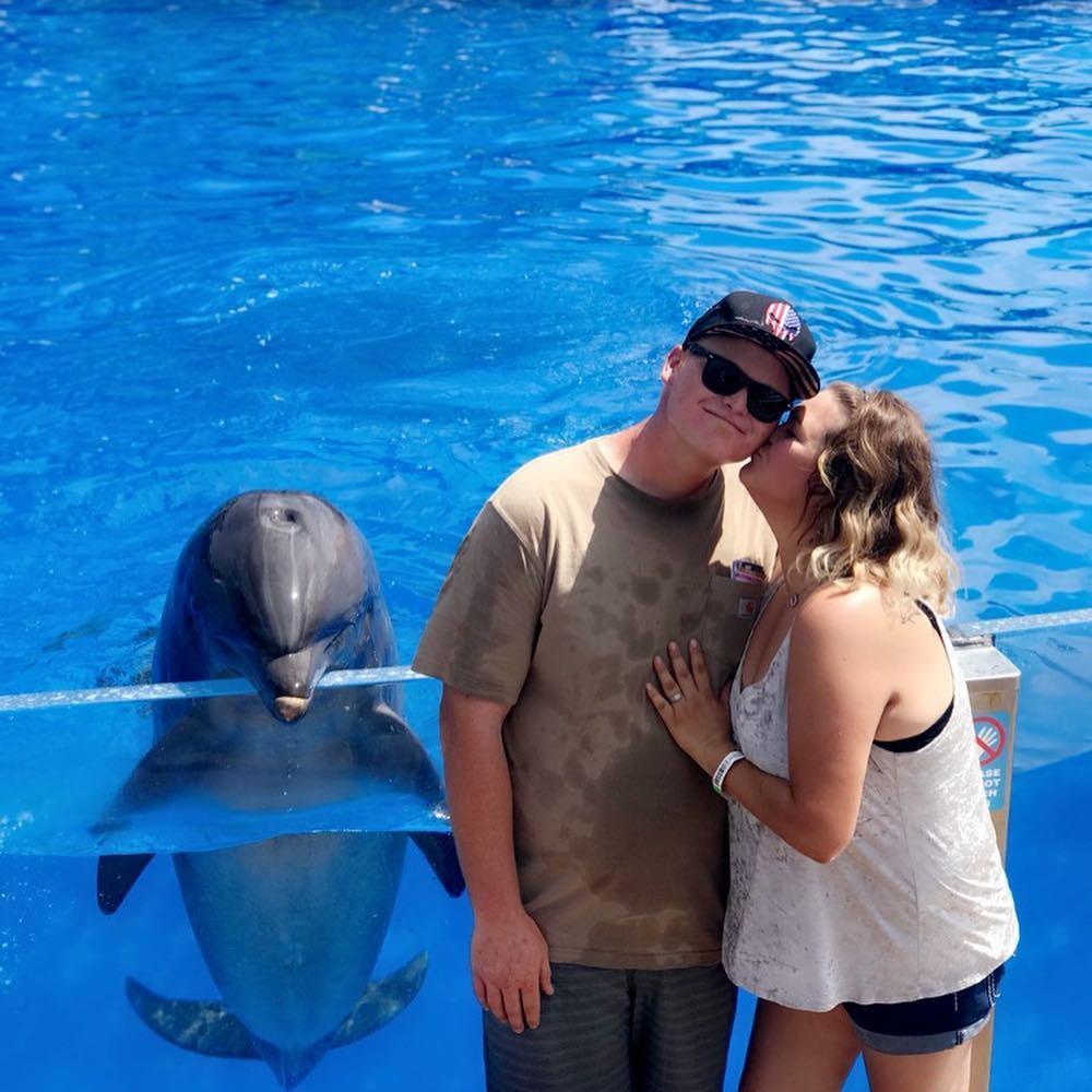 The day we got engaged. Nic proposed at SeaWorld at the end of the dolphin show!
