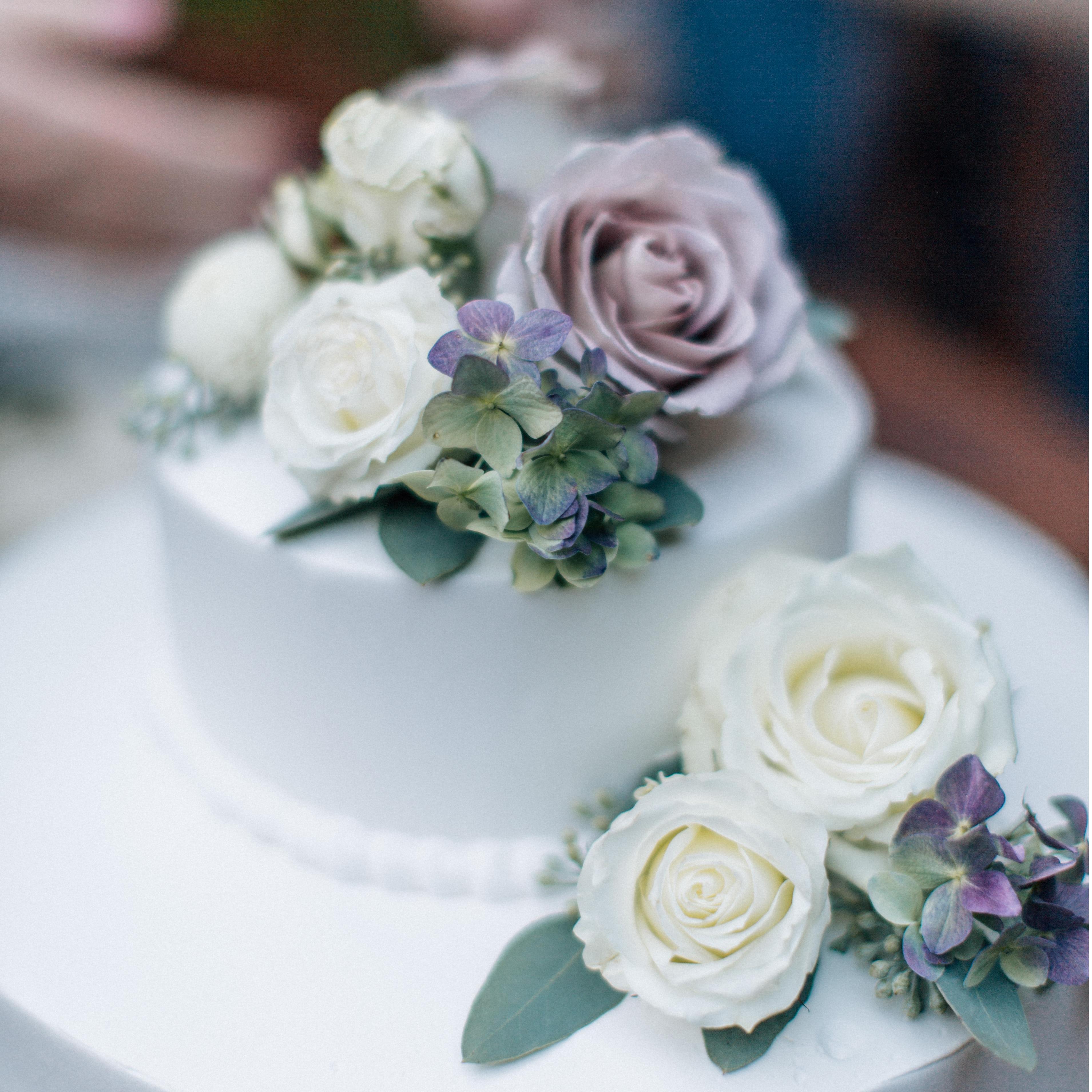The wedding cake! White cake with a lemon curd filling and fresh flowers for decoration