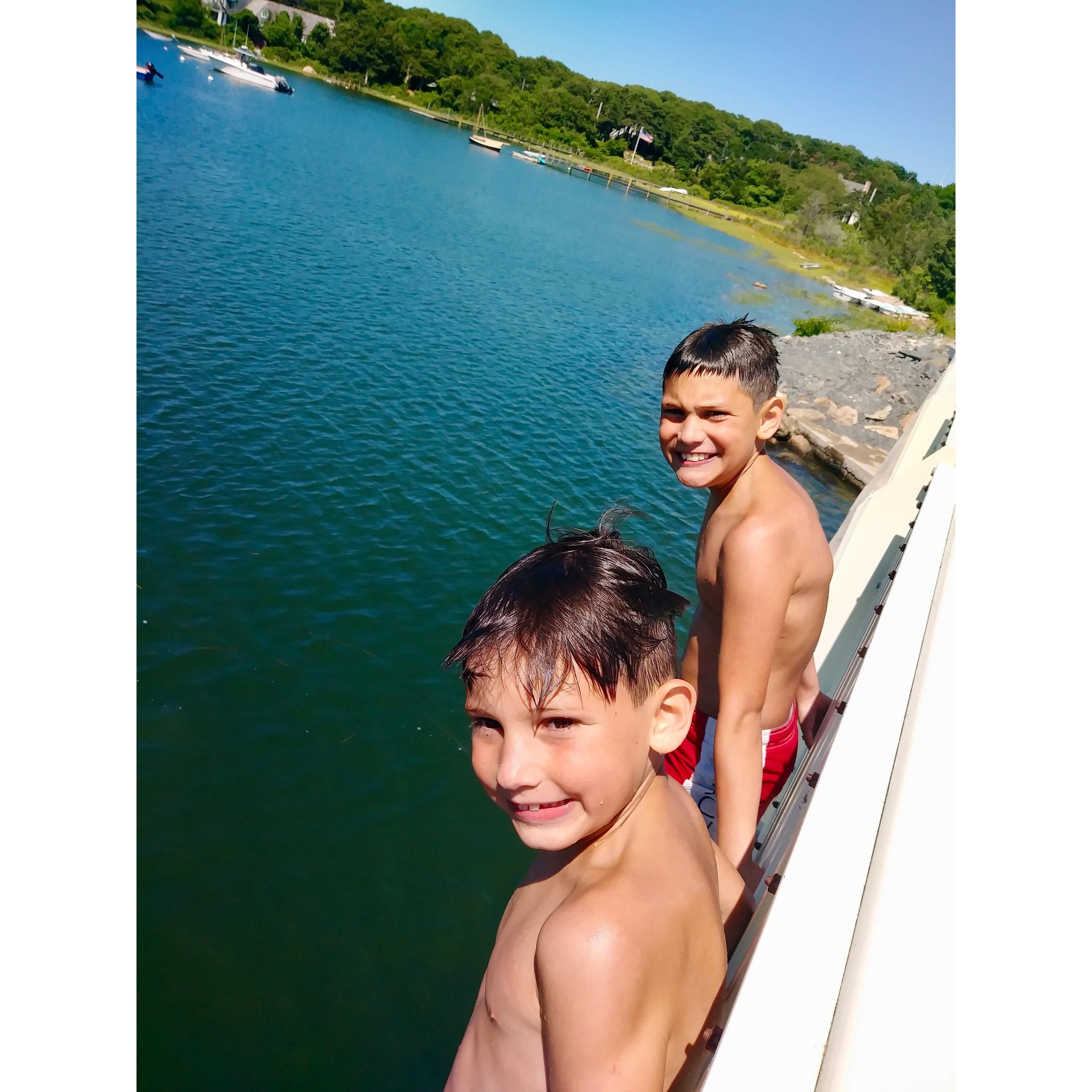 Brave bridge jumpers! It's a local tradition to jump from the Chapoquoit Bridge into West Falmouth Harbor at high tide. This 20 foot jump isn't for the light-hearted, but the boys don't blink an eye!