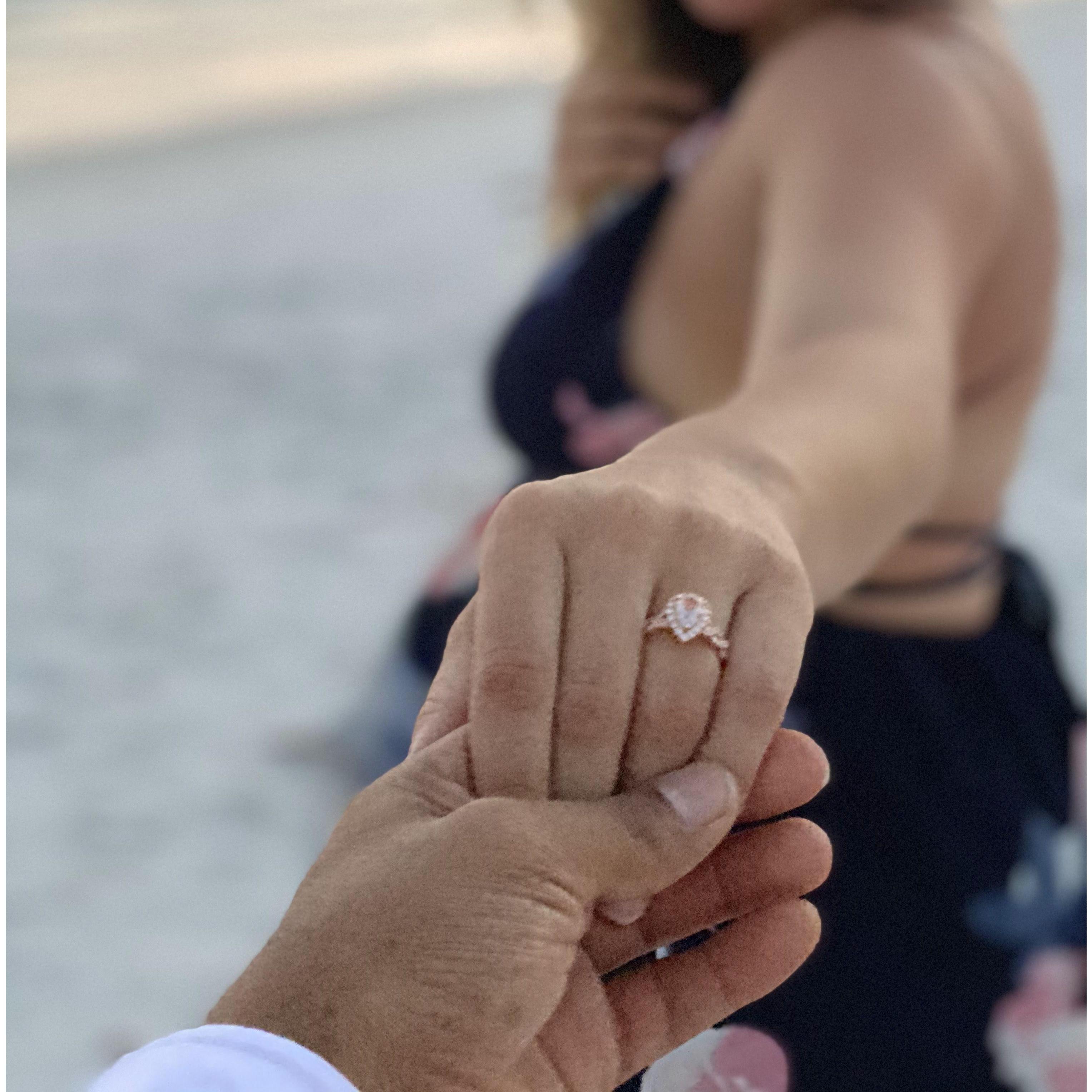 Julian proposes at one of our favorite places, Siesta Keys!