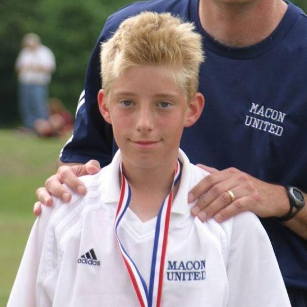 Spencer's main hobby growing up was soccer.