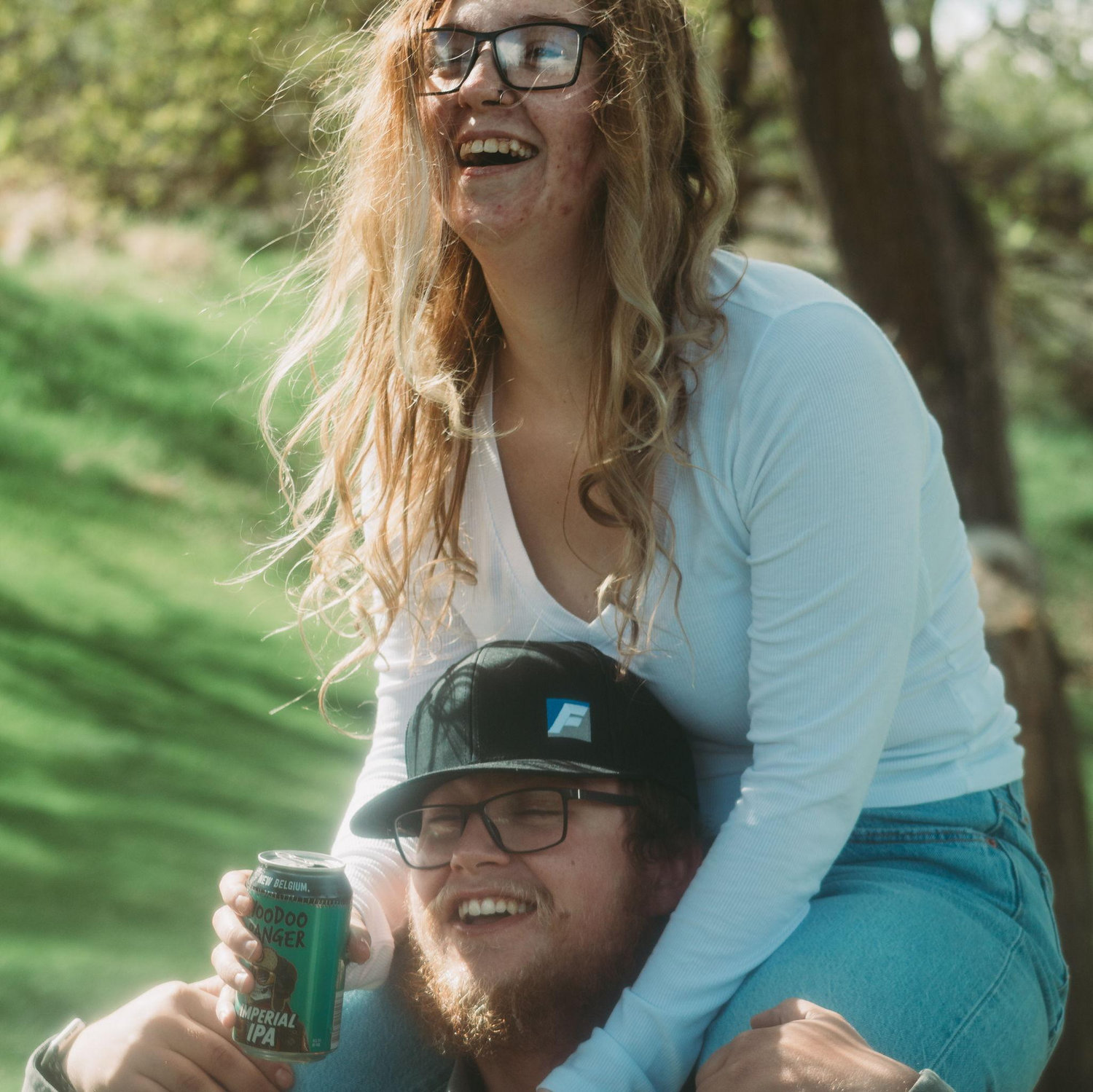 Pouring him some beer in our second engagement session