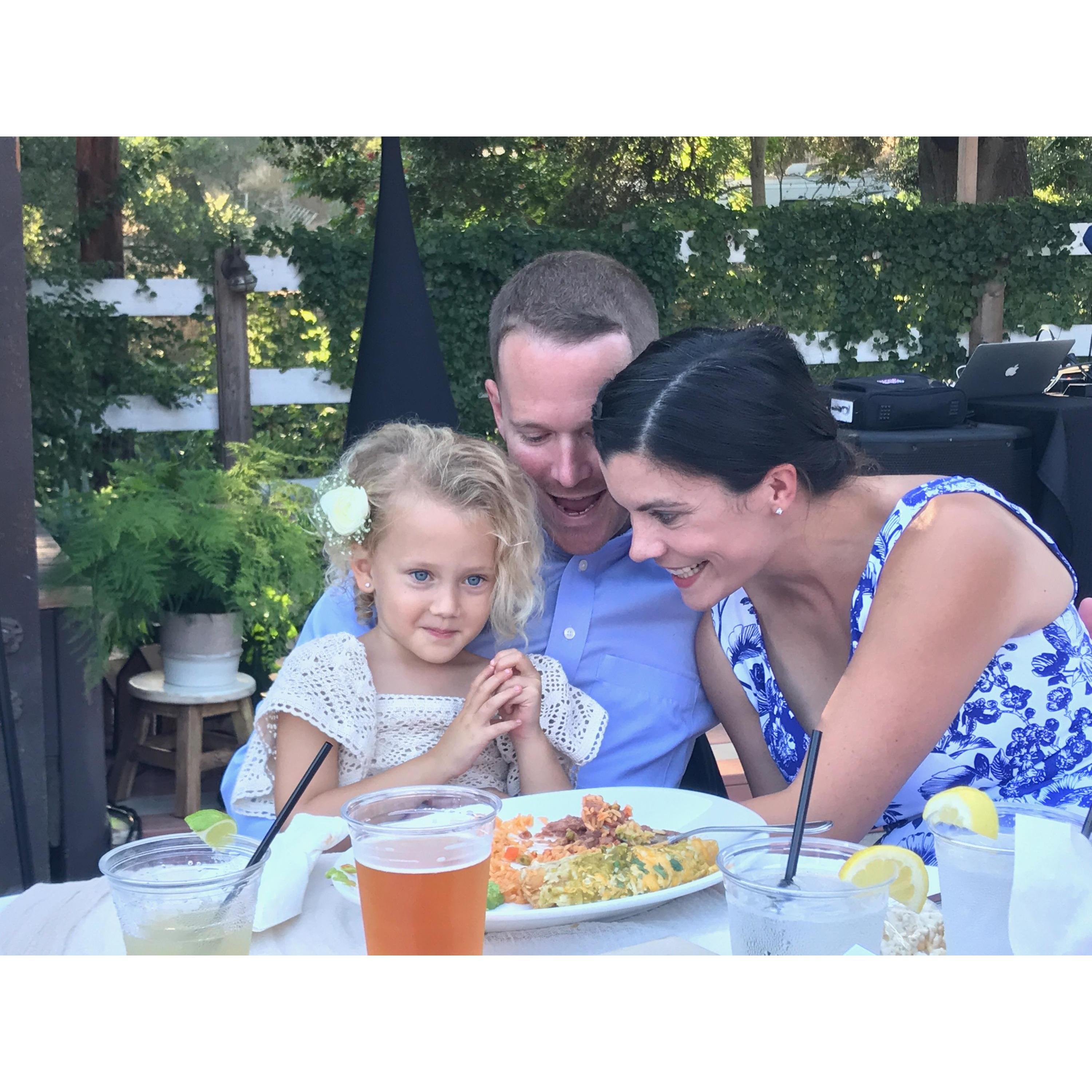 Eating some dinner with our ring bearer and oldest niece, Tessa.