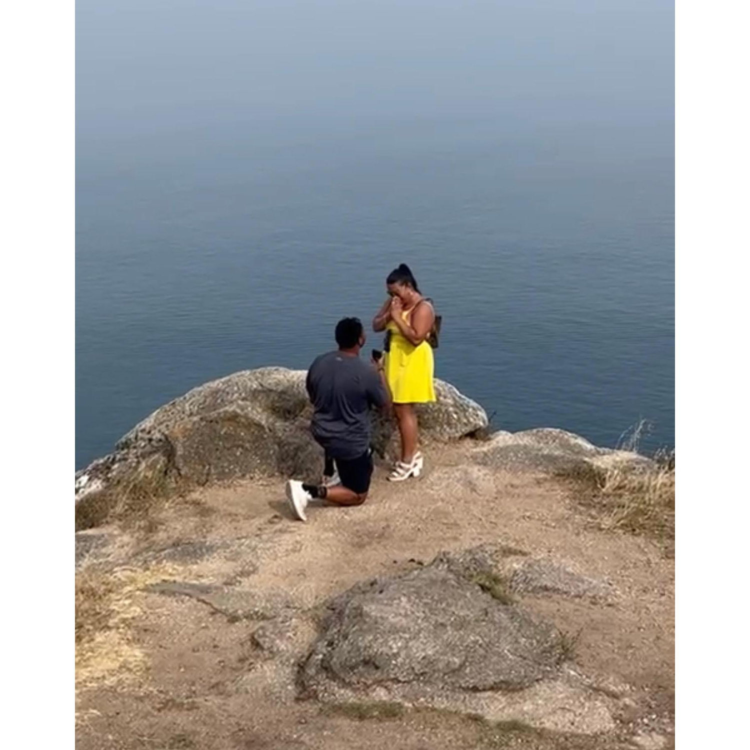 The "will you marry me" moment. Even on one knee he's still almost as tall as Dyna in heels.