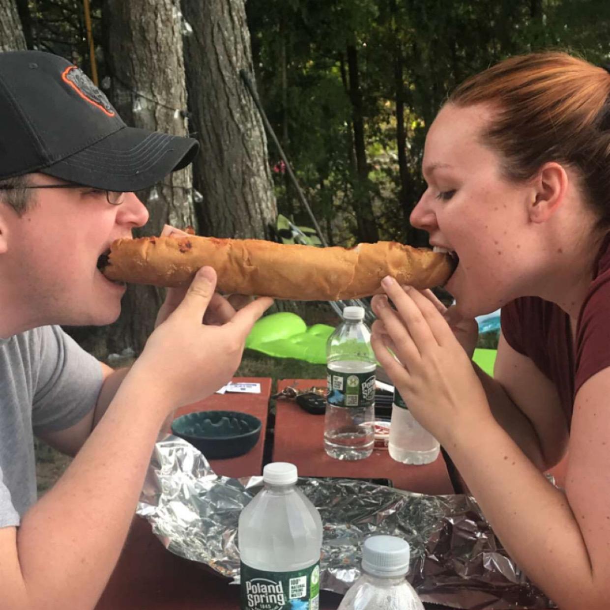 No utensils = eating French bread pizza Lady and the Tramp style
