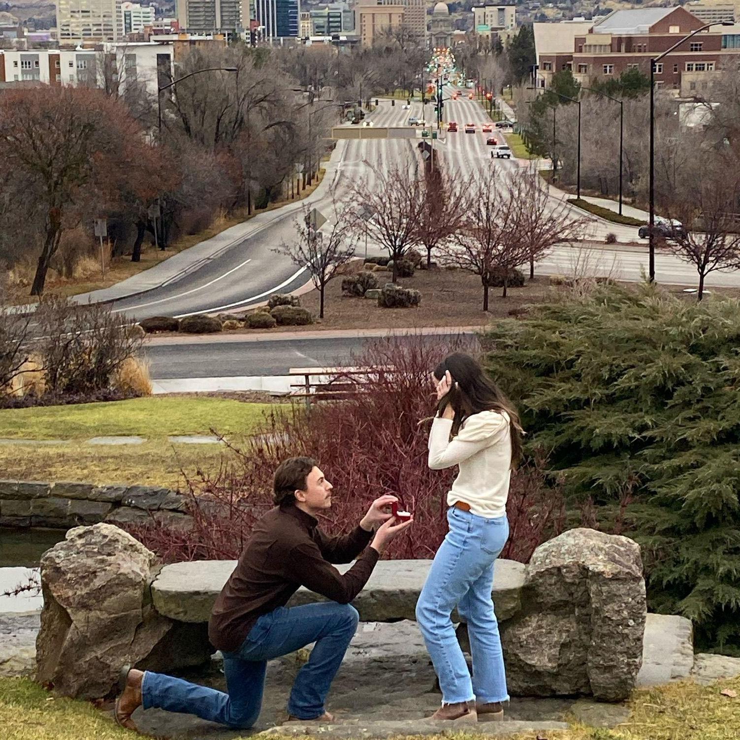 After a full day of "is it happening now?!" moments, perfectly choreographed with all of our family involved–Scott completely surprised Austie by getting down on one knee above the city they both love
