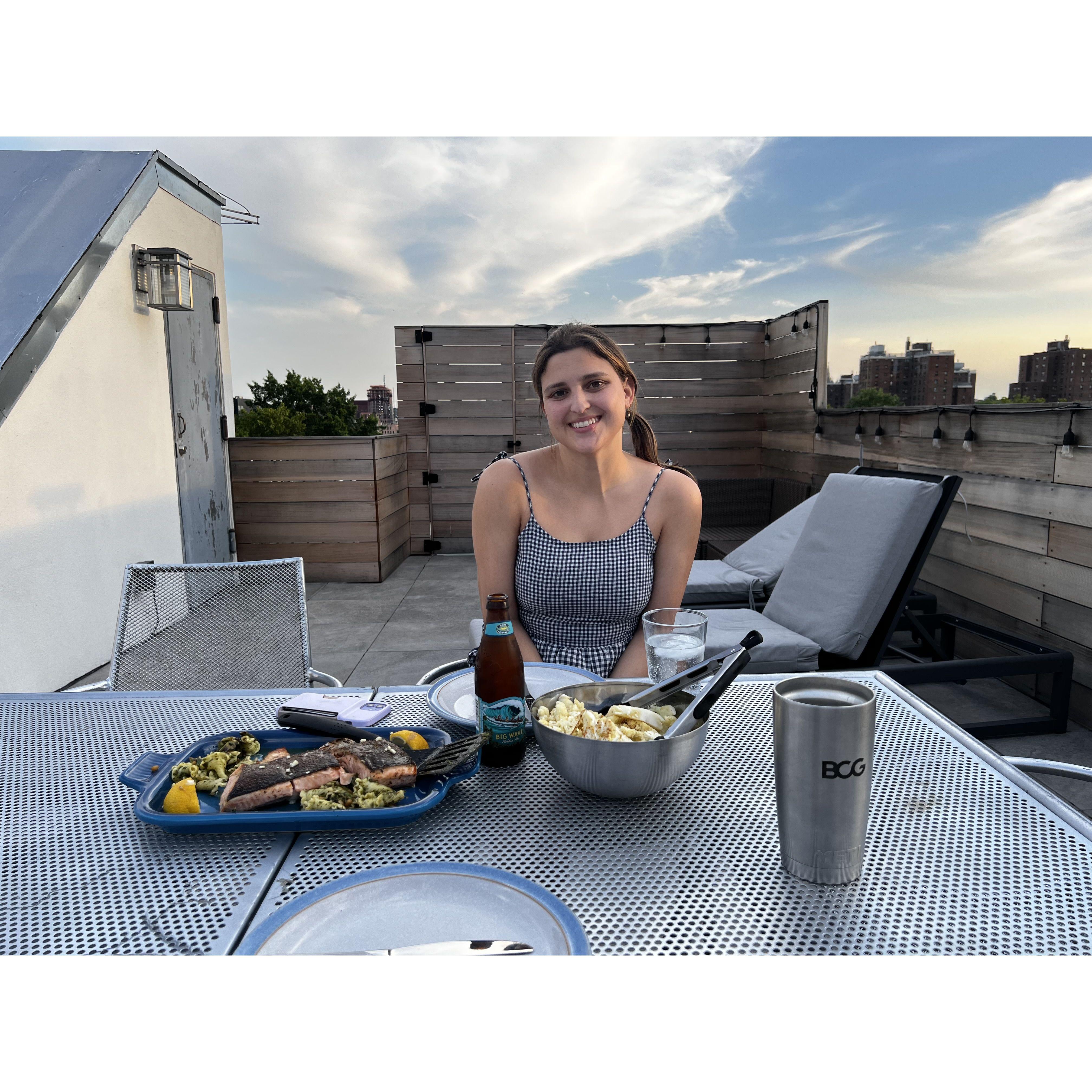 Taking advantage of our roof for dinners, movie nights via our projector, and hosting friends