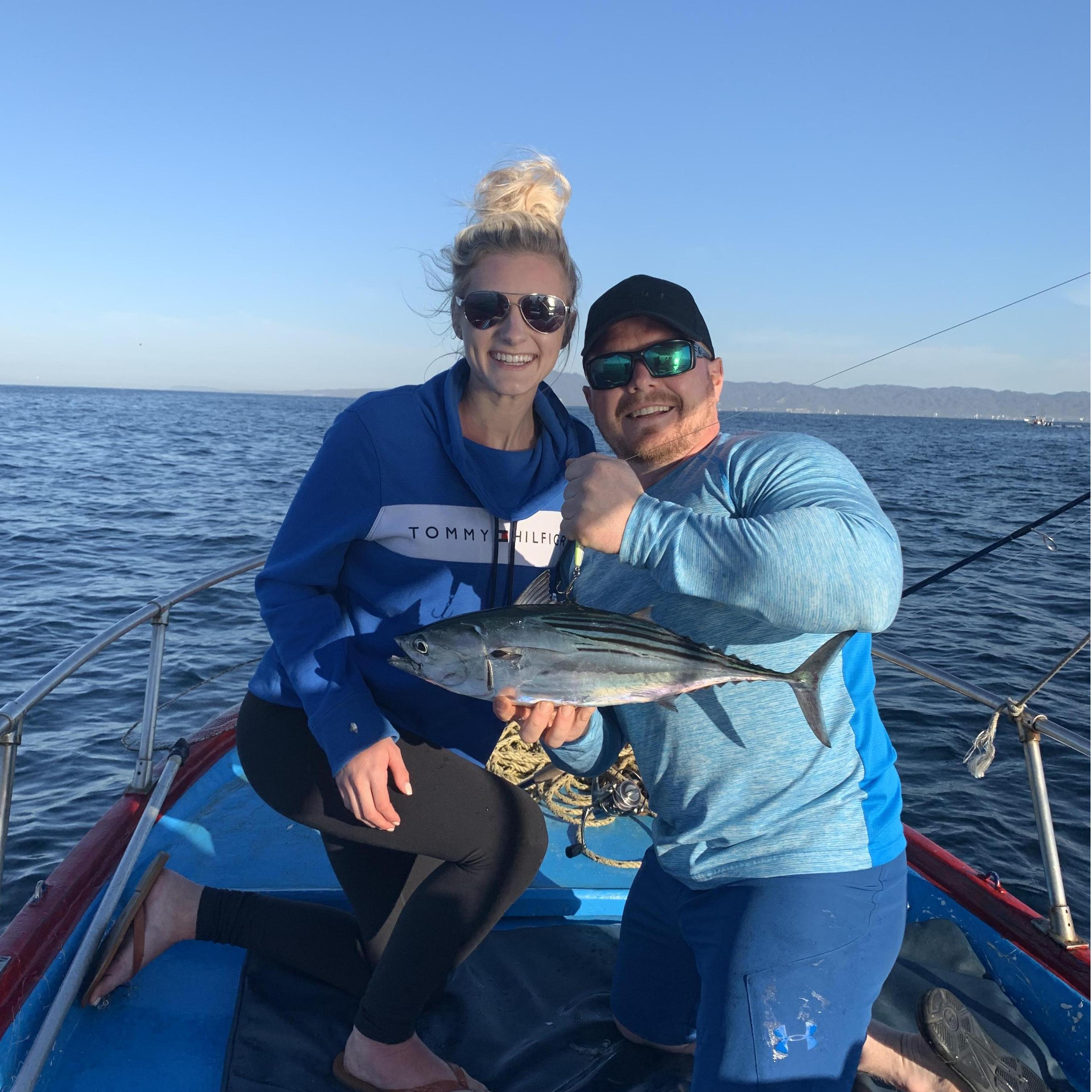 Deep-sea fishing where we caught bonitas (yes, I outfished him here too!)
