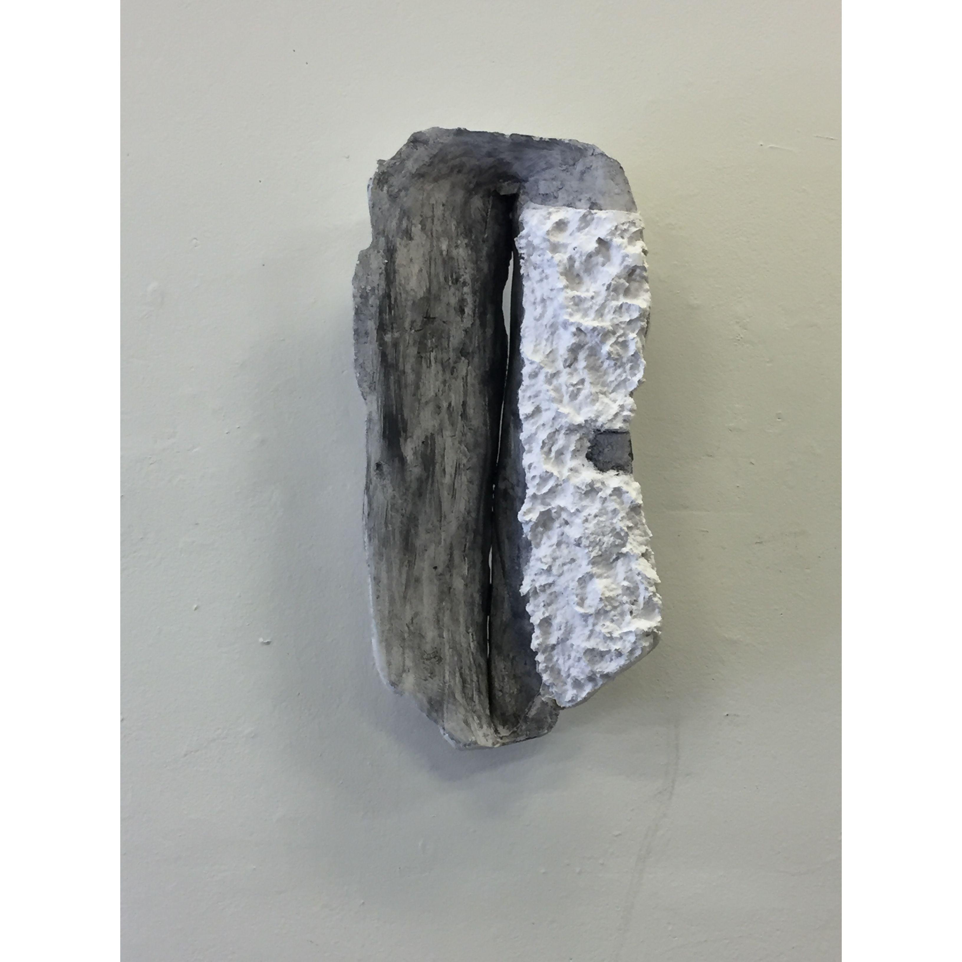 This is the sculpture that J.P. gave to Silvie at Anderson Ranch. The night before he moved in with her, it fell off the wall and shattered. Its work was done.