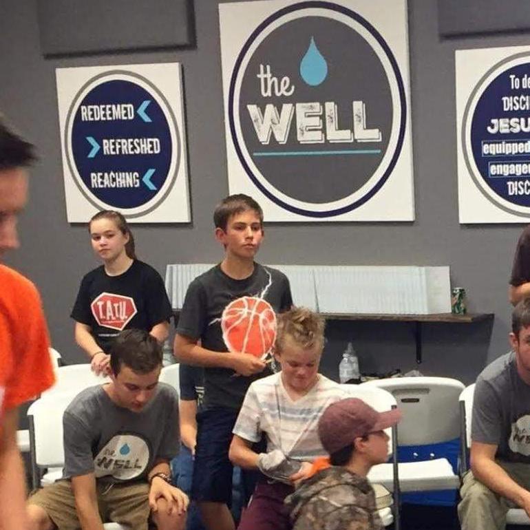 Noelle and Jonathan are 13 in this picture, watching youth group games