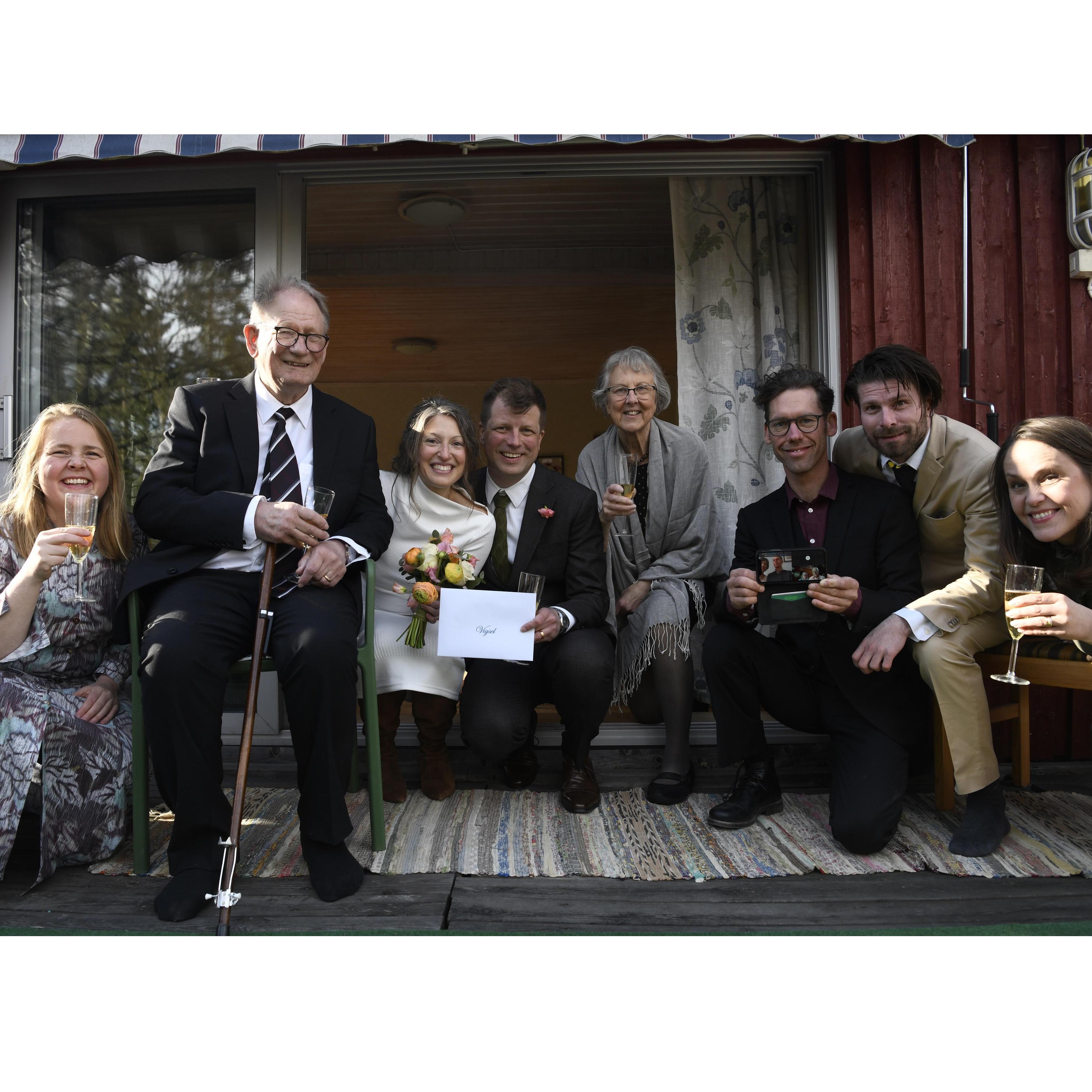 Family photo right after our ceremony... notice Cindy, Jeff, Bob, and Denise on screen with us too!