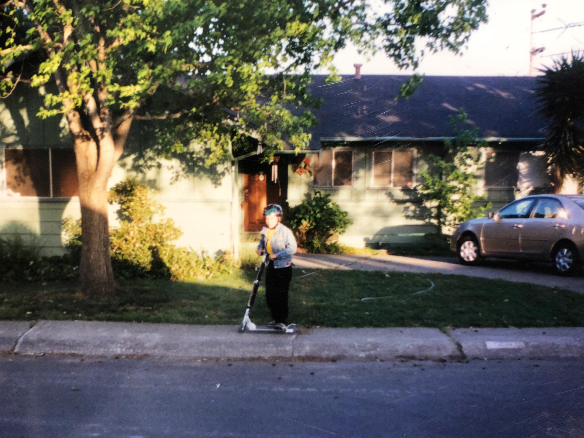 Conner on a scooter