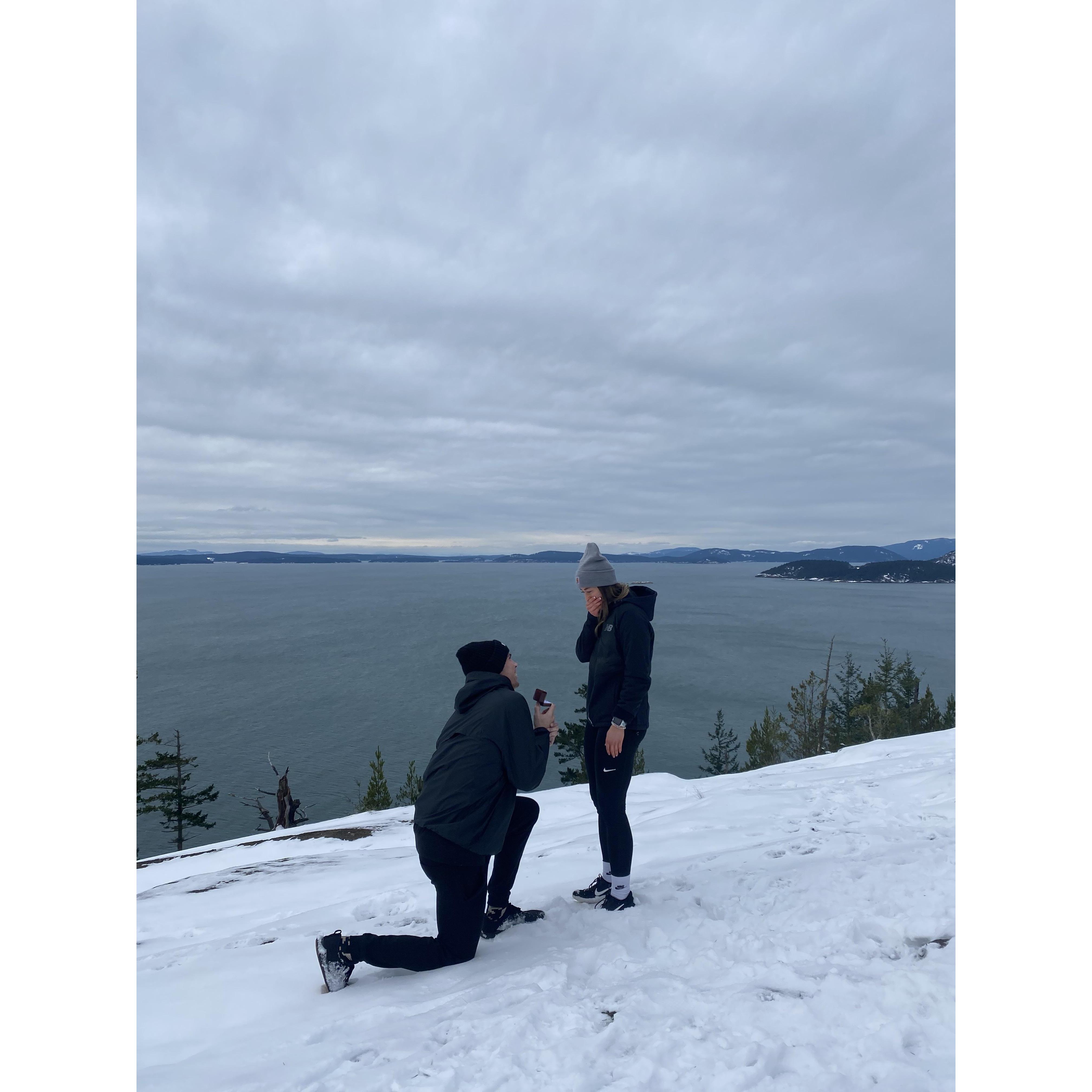 The proposal: Sares Head trail, Anacortes, WA. 
Her reaction moments before saying "YES!" 
01.01.2022