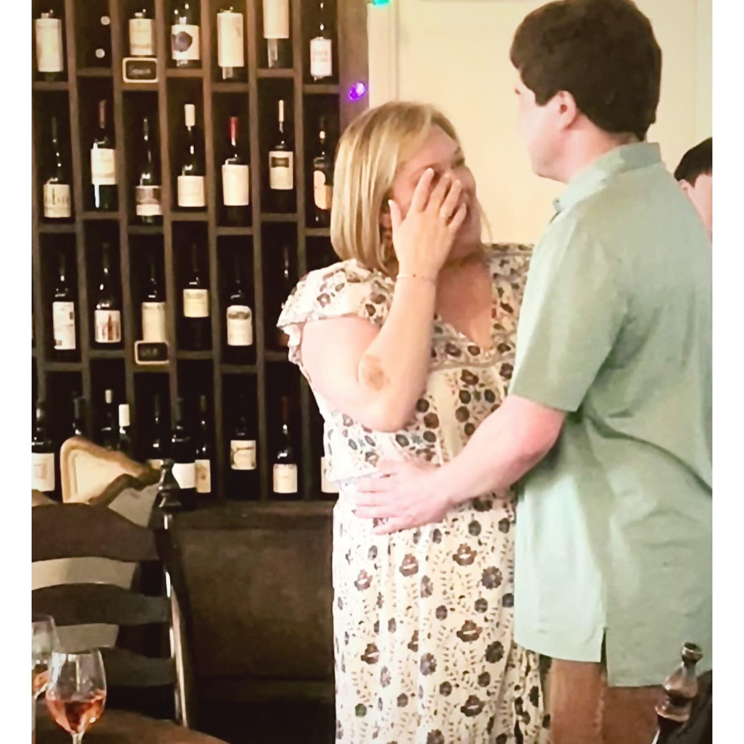 Our engagement at Bohemian Wine Bar in Plaza Midwood. The location of our first date!