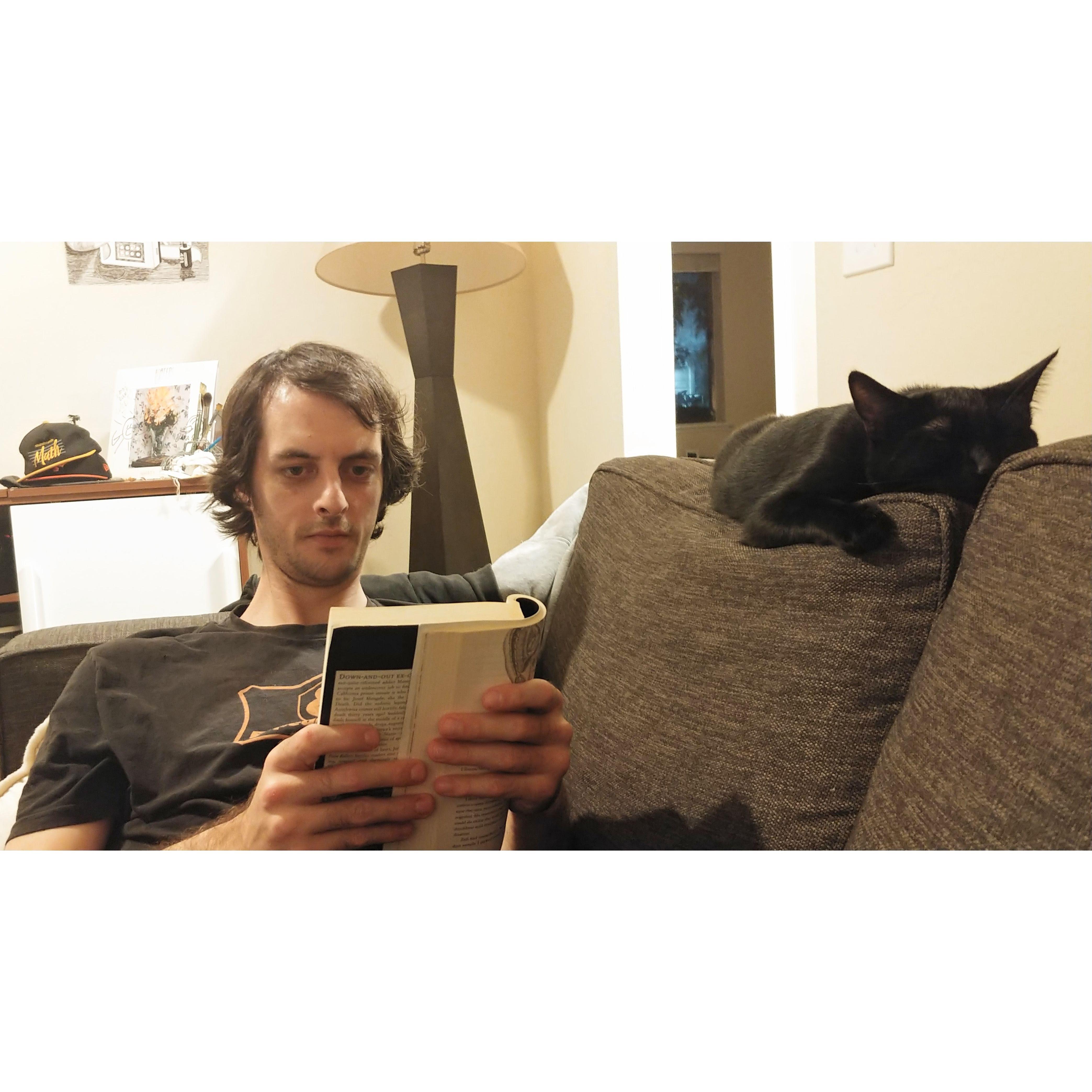 Maddy's favorite things: couch cuddles, Afeni, and a good book.