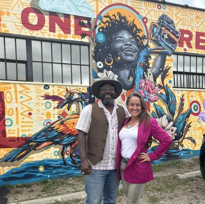 Celebrating Tommy complete this gorgeous mural in Asheville