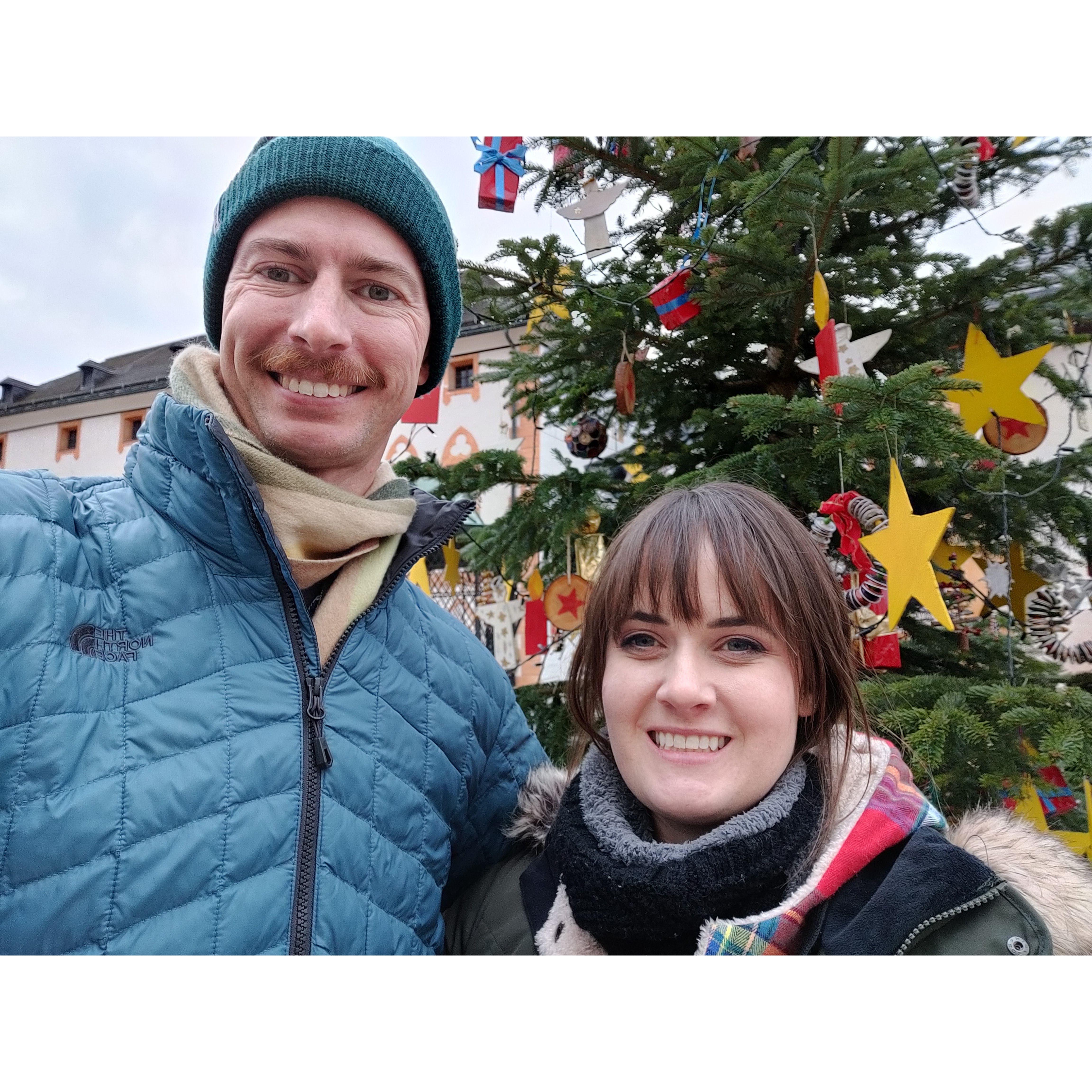 Posing in front of an adorable Christmas tree in Salzburg, Austria : Dec 2022