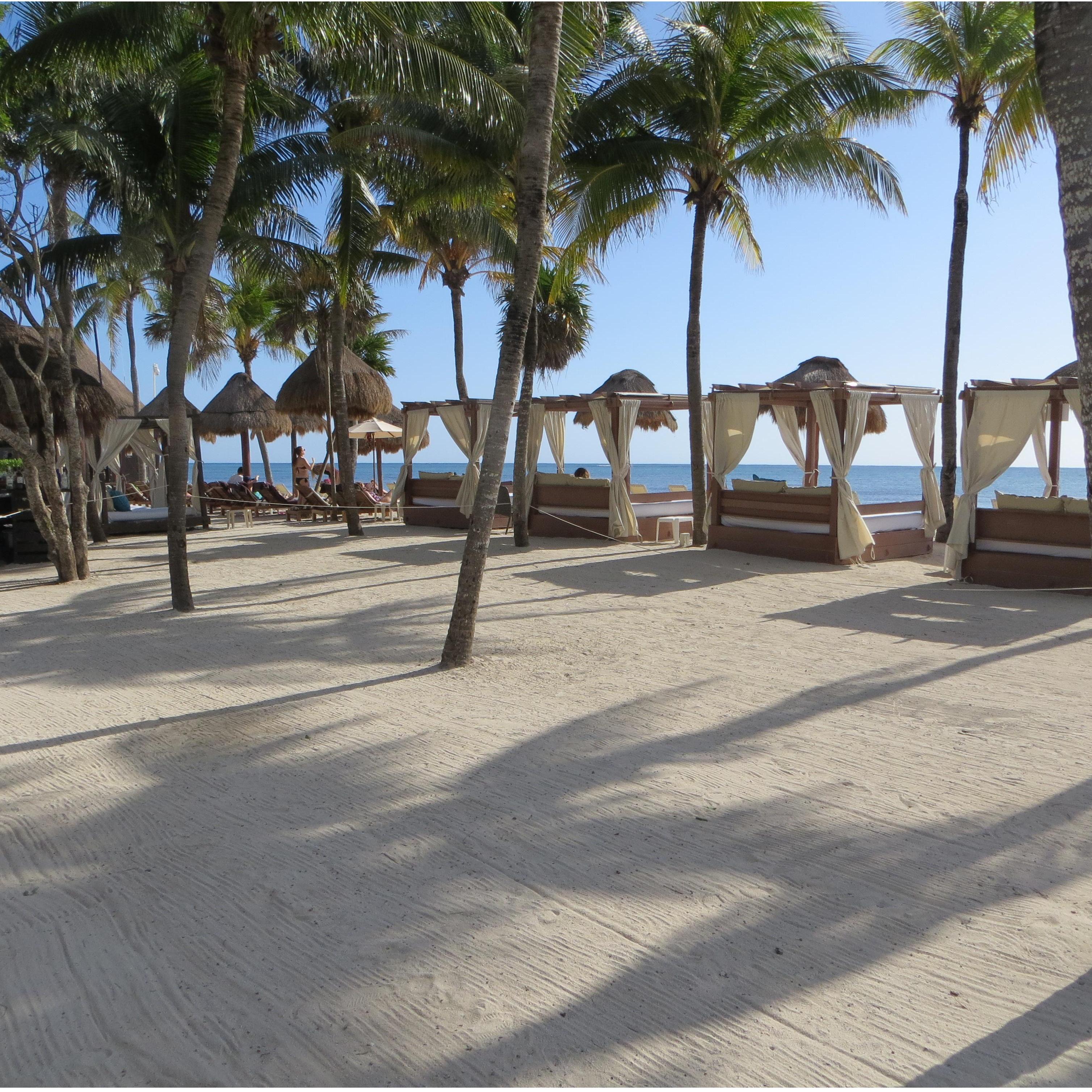 Relaxing cabanas on the beach.