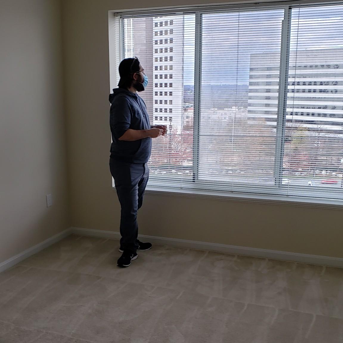 We're currently apartment hunting. This was supposed to be a pic of the room, but Hannah kinda likes how its a picture of Nick.